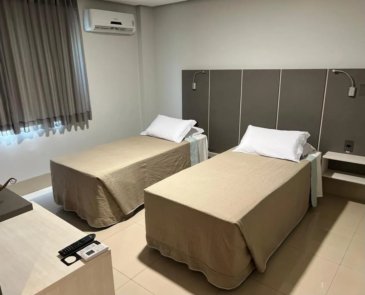 Bed in Pumma Business Hotel