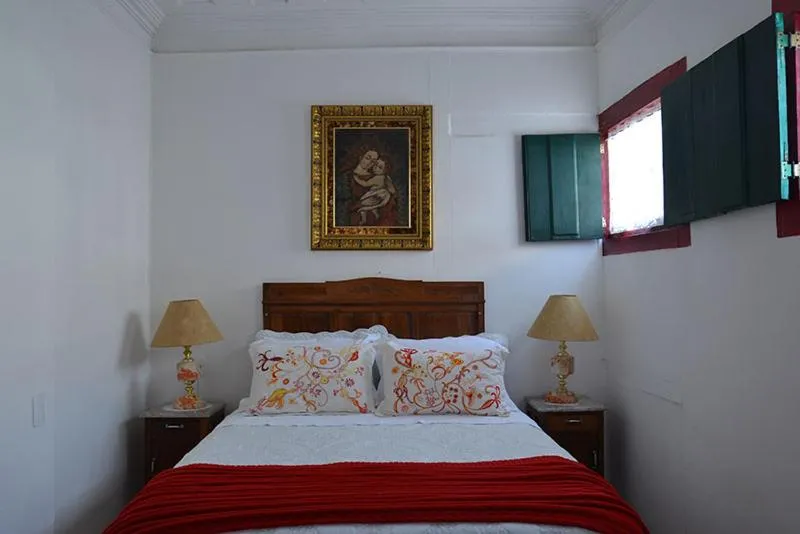 Bed in Pousada Guignard