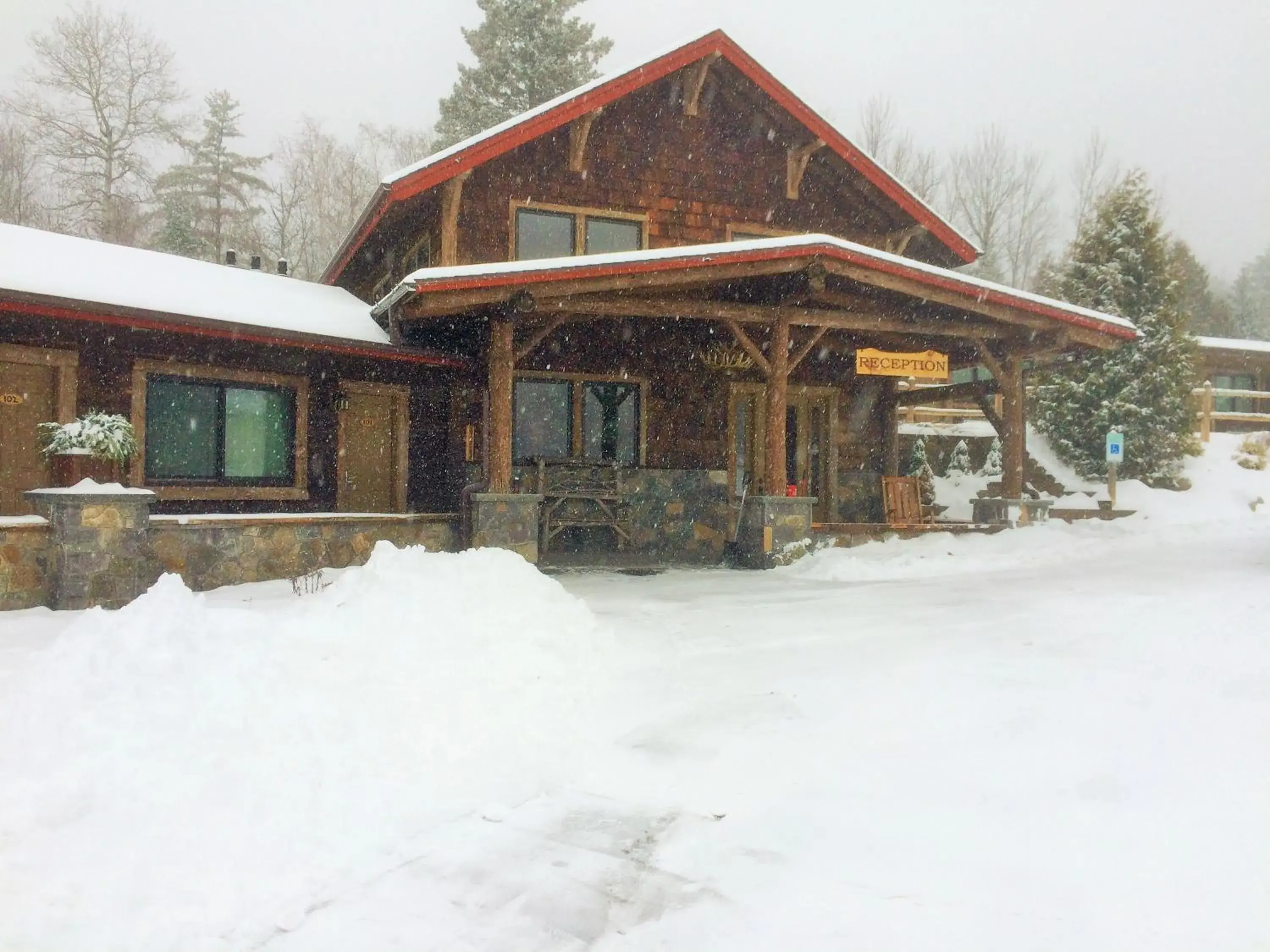 Facade/entrance, Winter in Adirondack Spruce Lodge