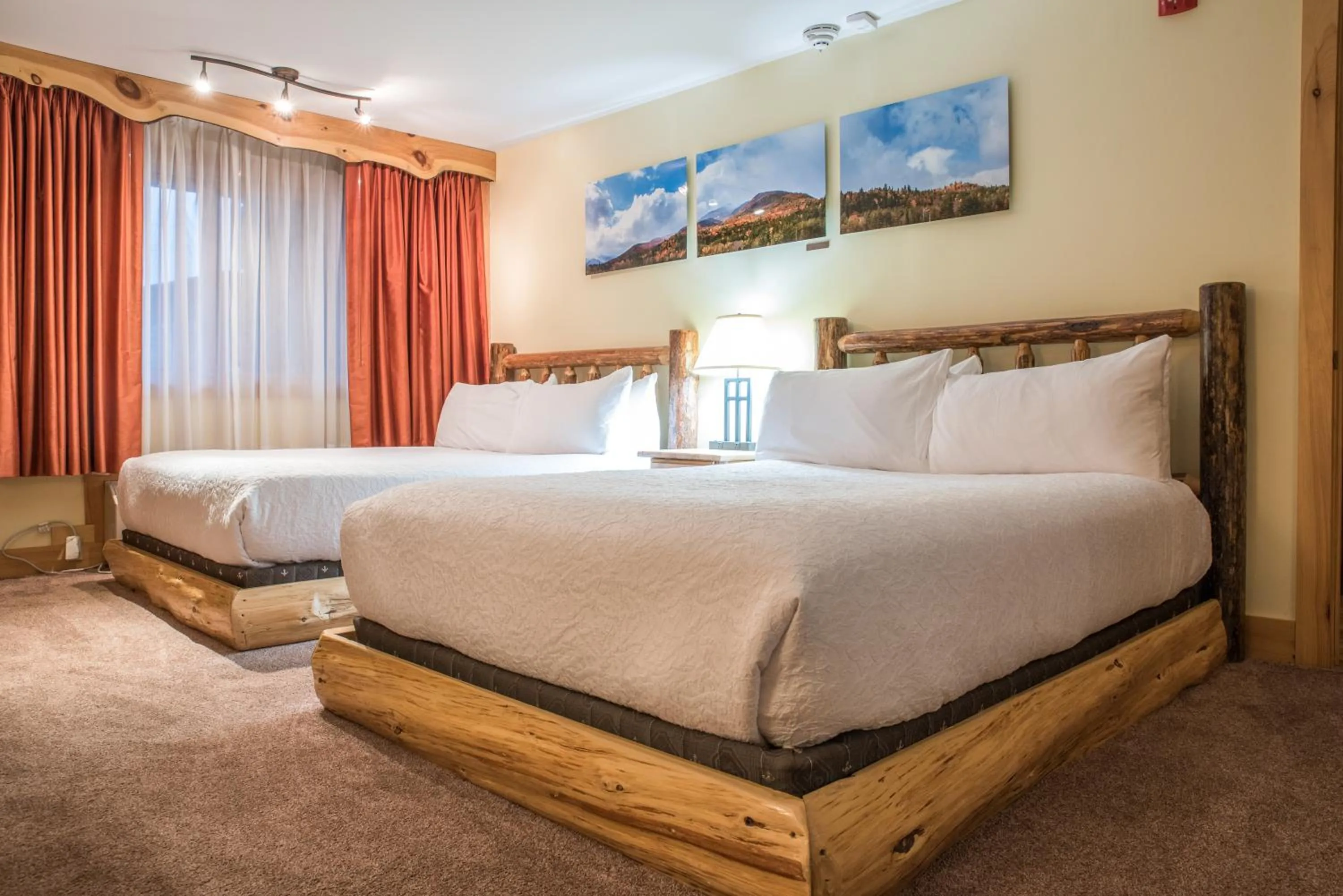 Bed in Adirondack Spruce Lodge