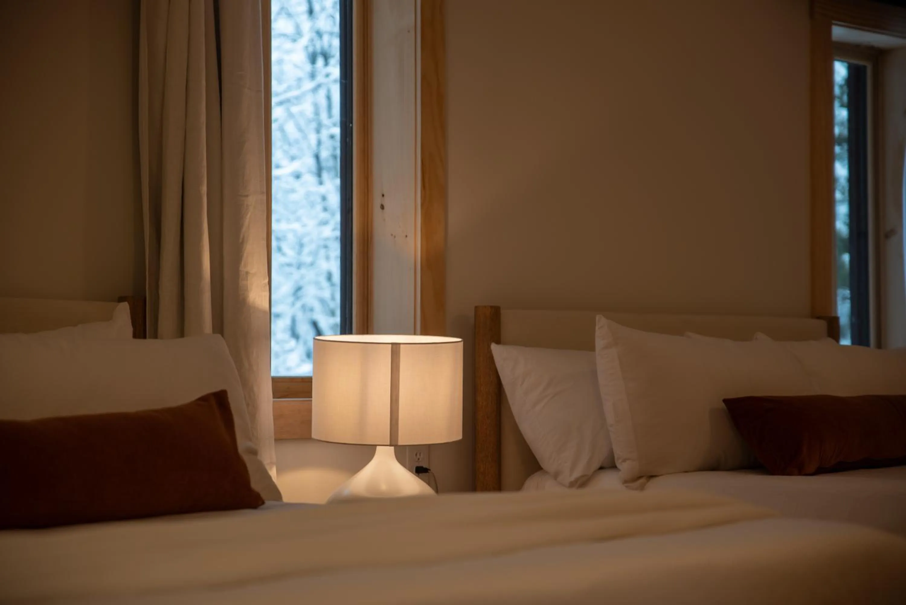 Bed in Adirondack Spruce Lodge