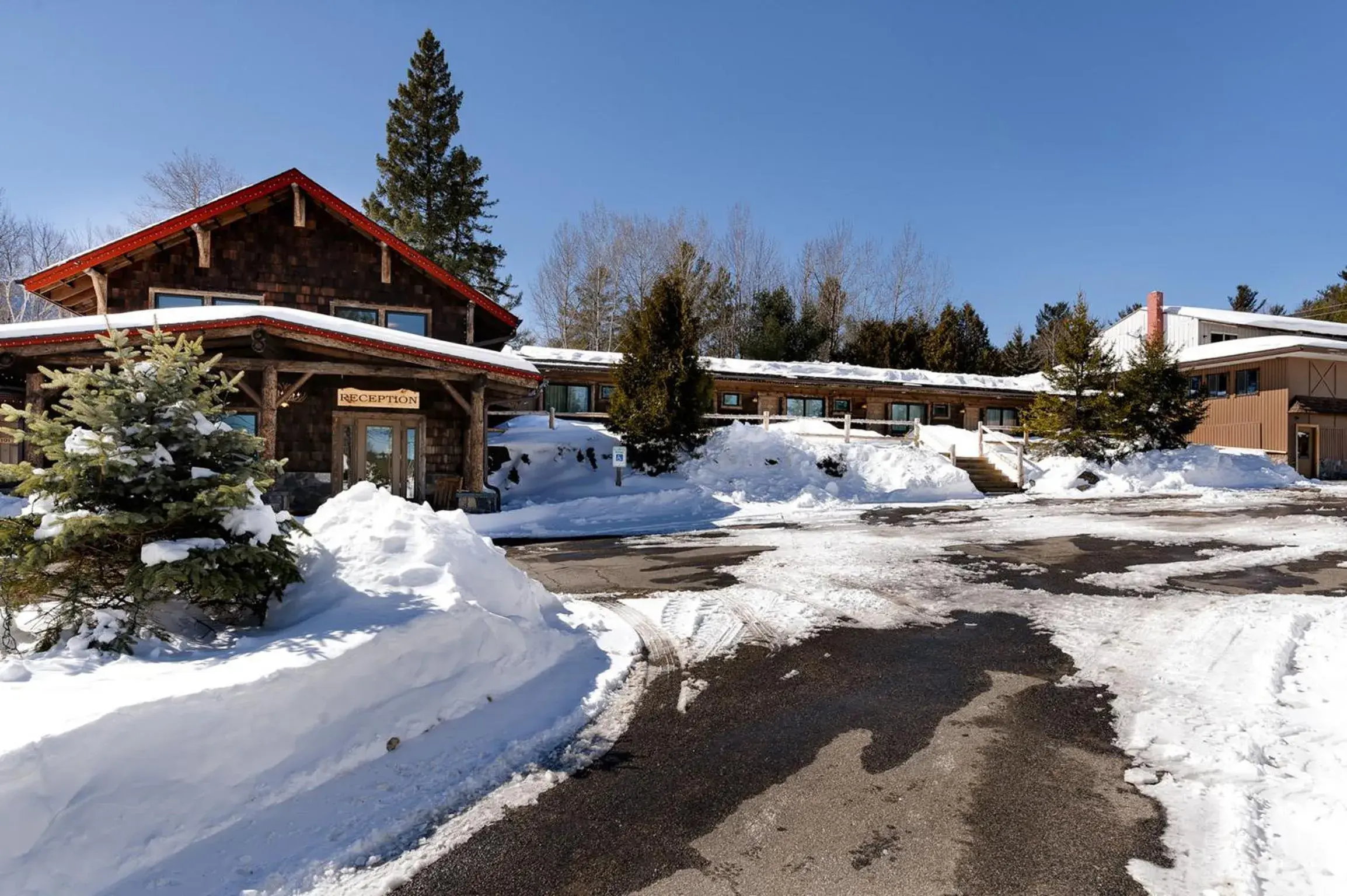 Facade/entrance, Winter in Adirondack Spruce Lodge