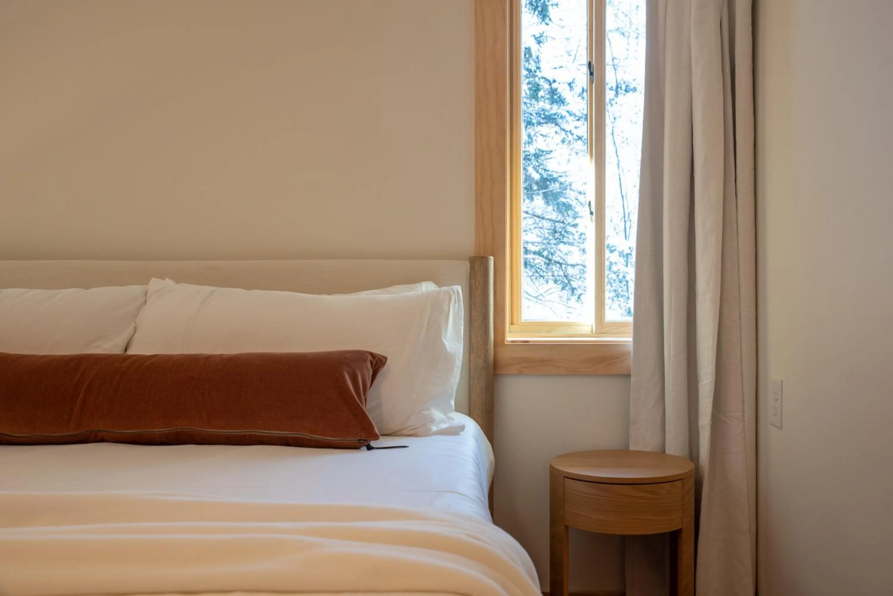 Bed in Adirondack Spruce Lodge