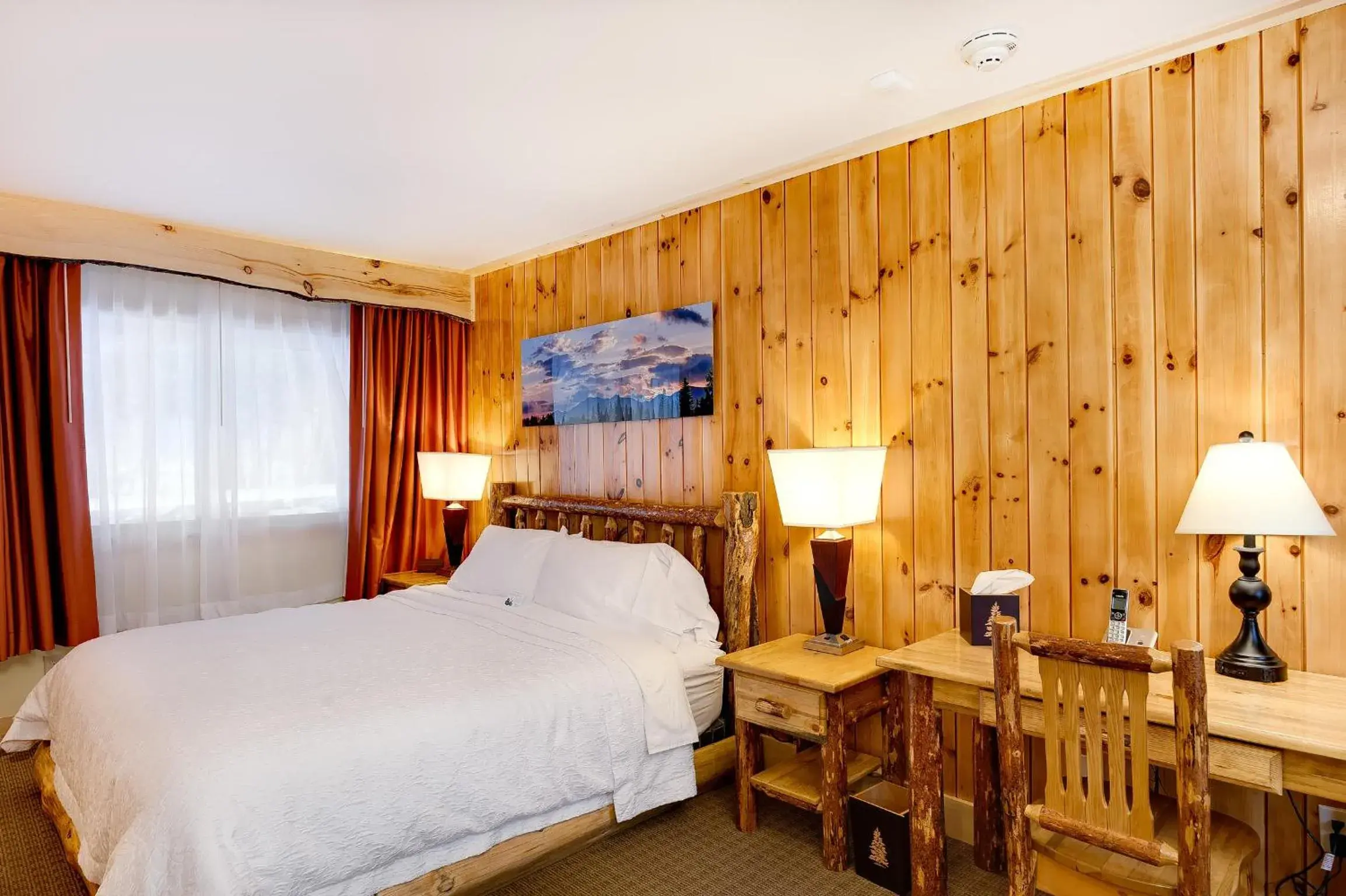 Bed in Adirondack Spruce Lodge