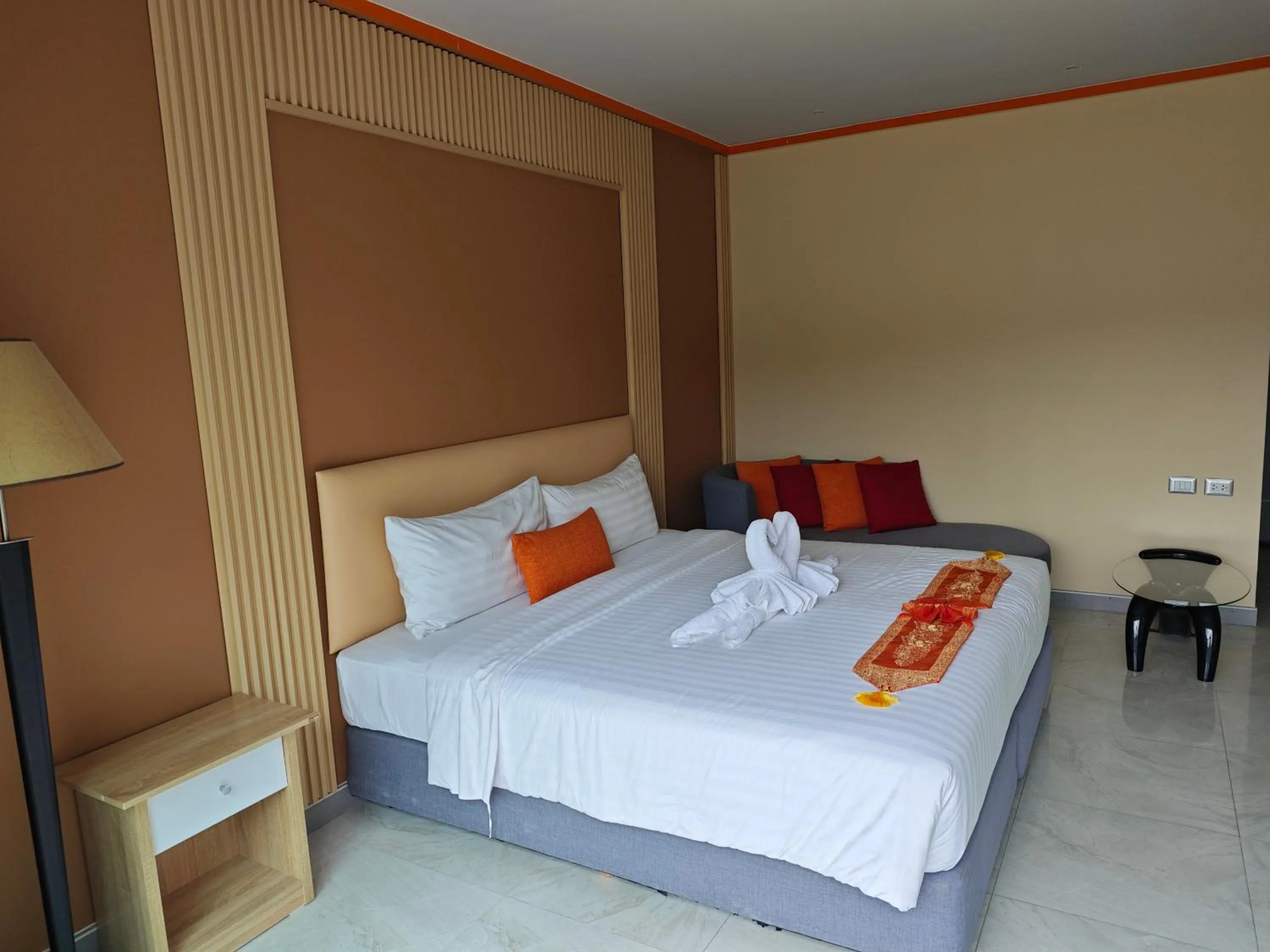 Bed in Chabana Kamala Hotel