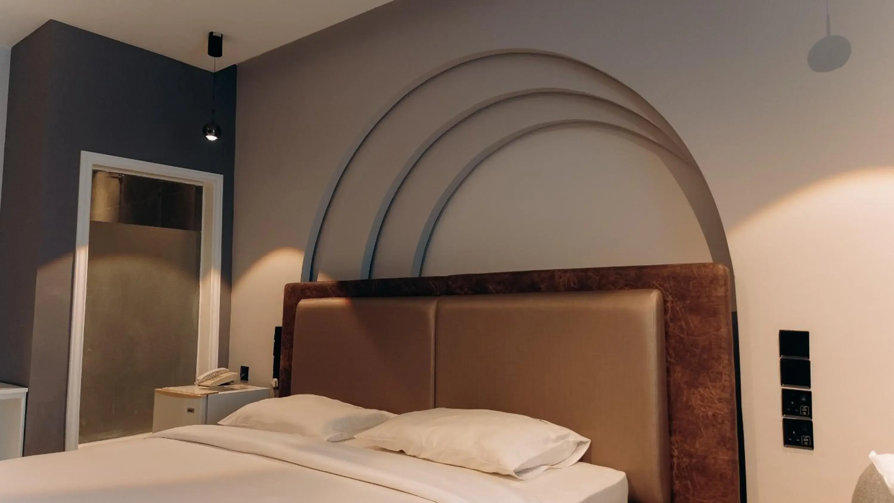 Bed in Tanga Beach Resort & Spa Bed in Tanga Beach Resort & Spa