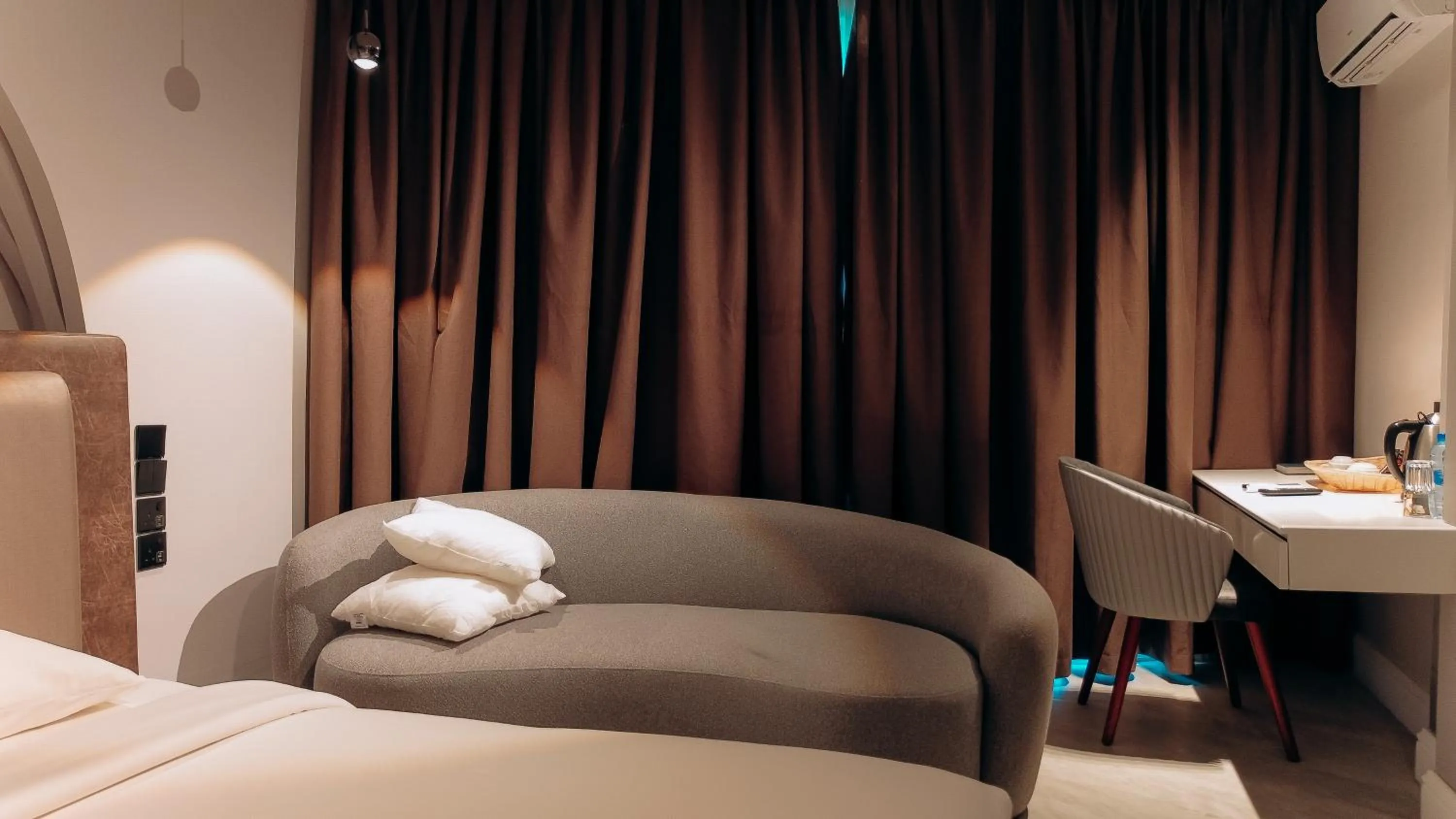 Bed in Tanga Beach Resort & Spa