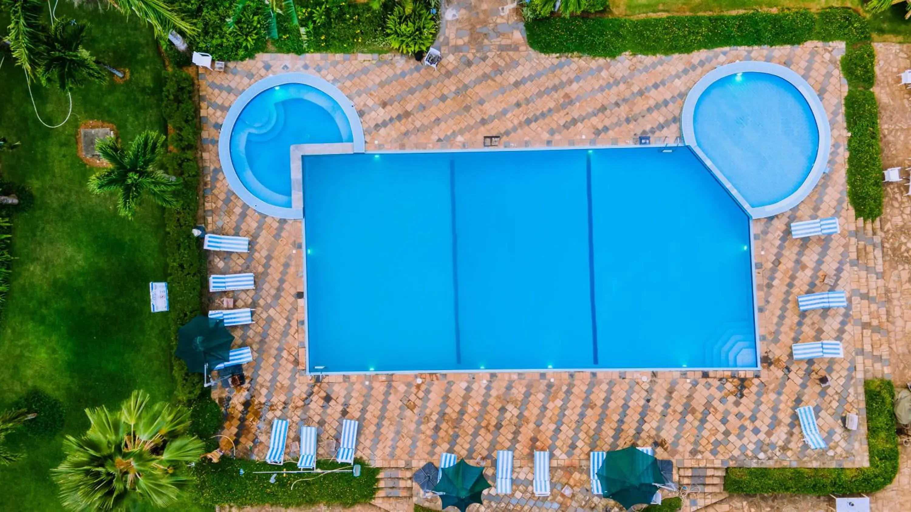 Pool view in Tanga Beach Resort & Spa Pool view in Tanga Beach Resort & Spa