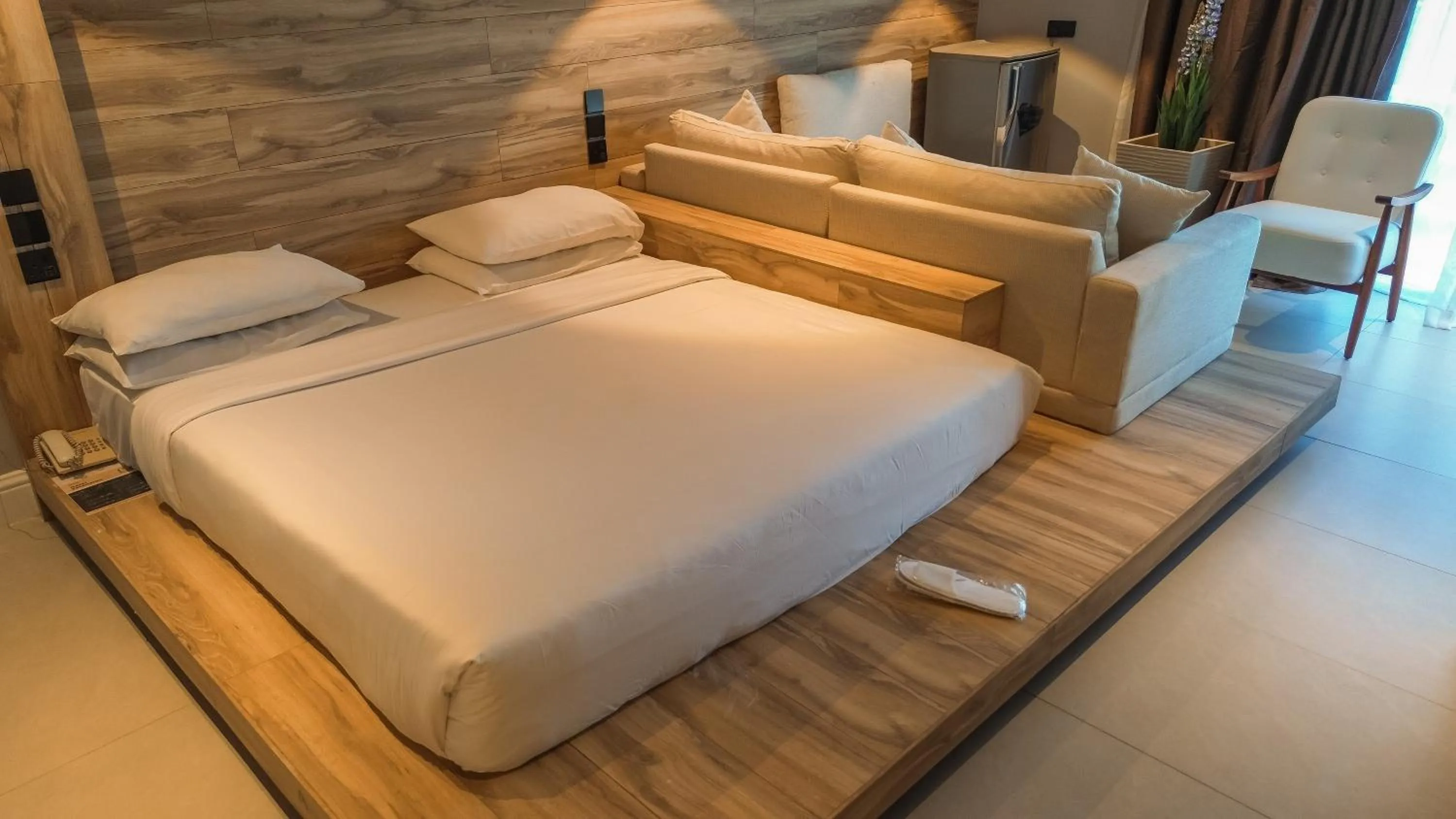 Bed in Tanga Beach Resort & Spa