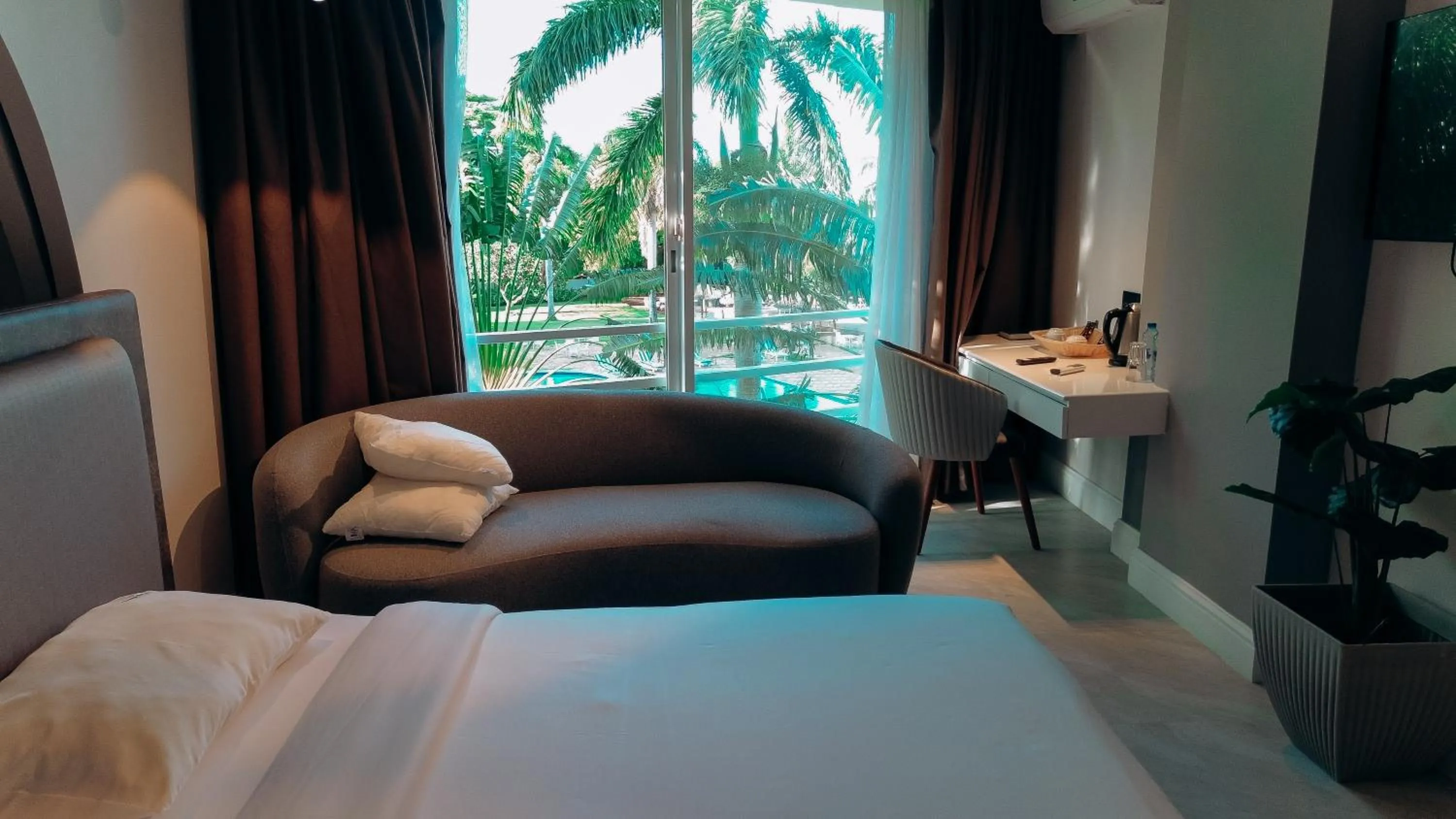 Bed in Tanga Beach Resort & Spa