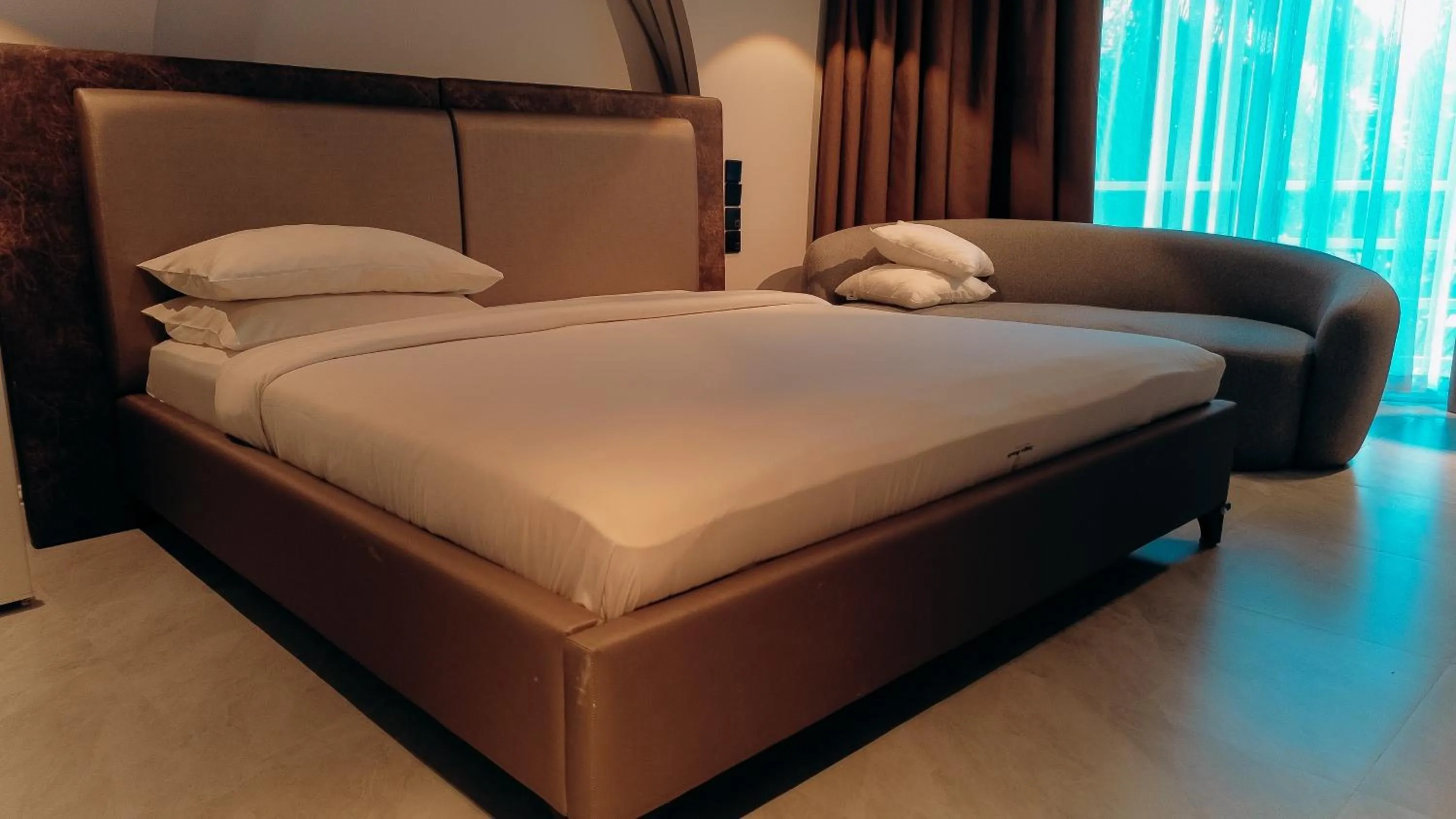 Bed in Tanga Beach Resort & Spa
