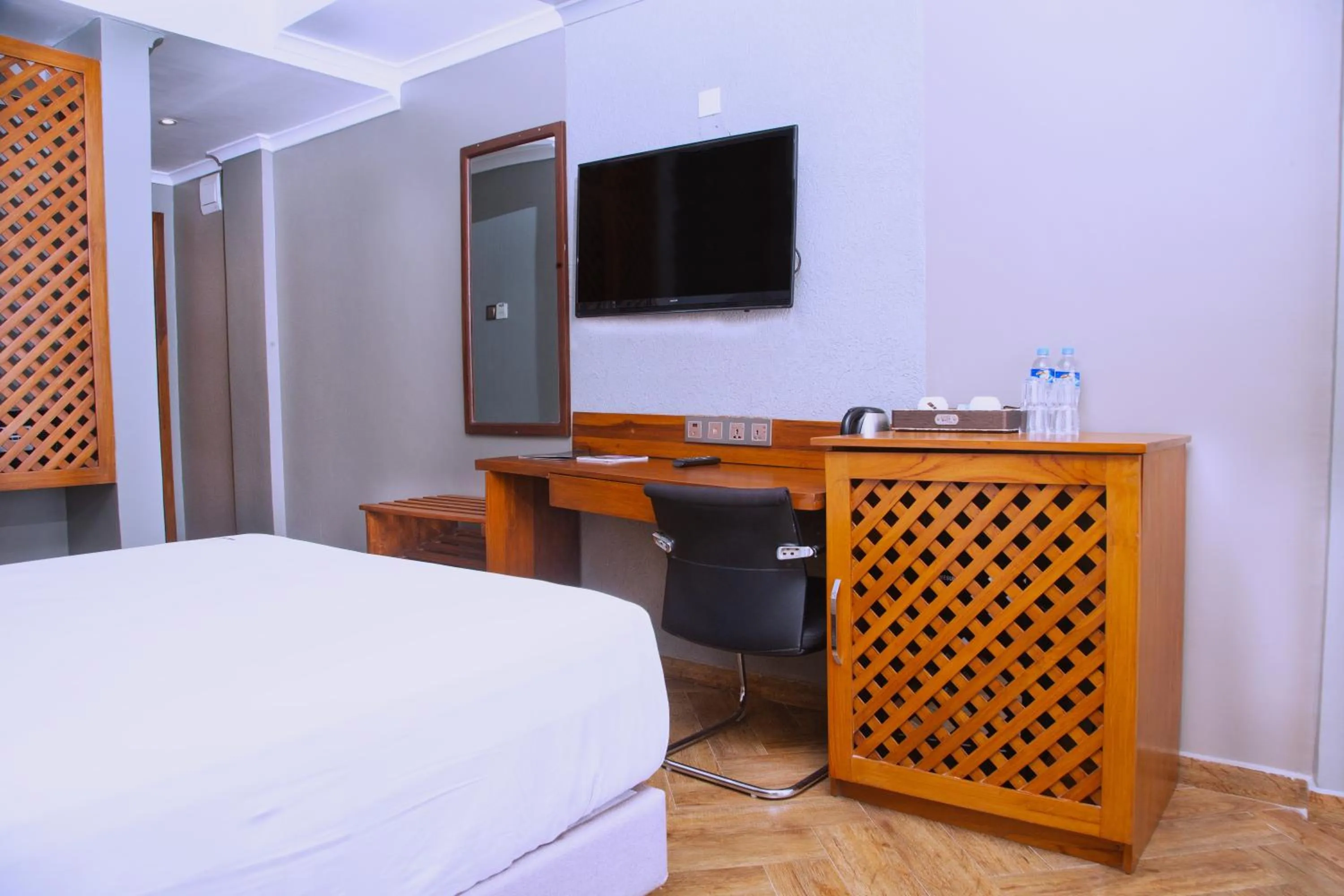 Bed in Tanga Beach Resort & Spa