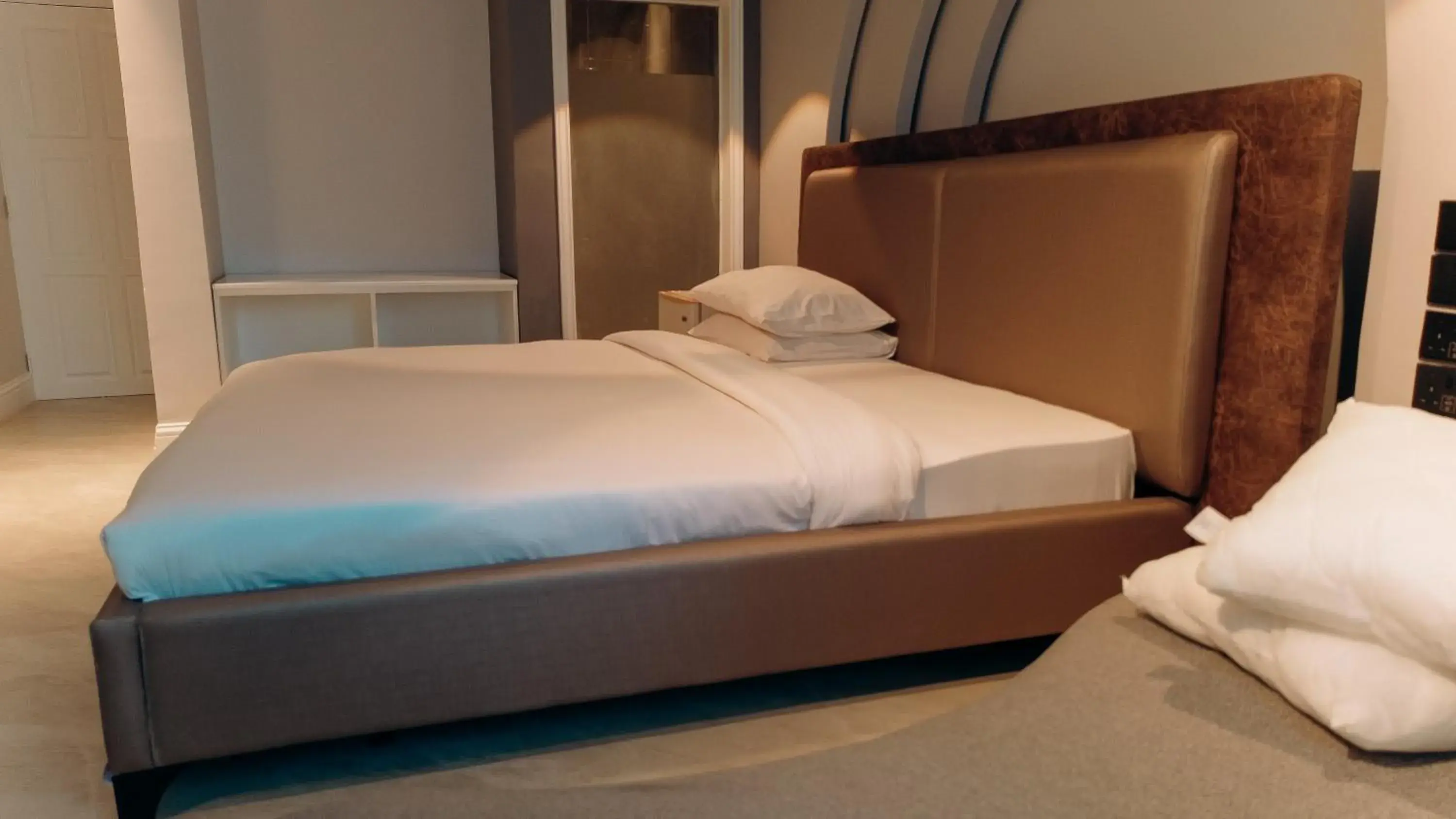 Bed in Tanga Beach Resort & Spa Bed in Tanga Beach Resort & Spa
