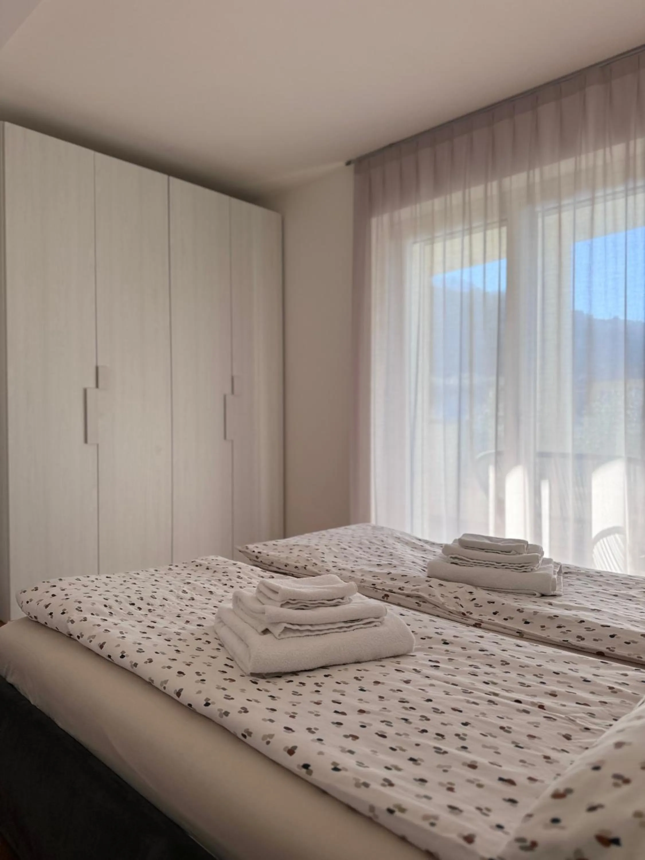 Bedroom, Bed in GARDA LIVING APARTMENTS Riva del Garda