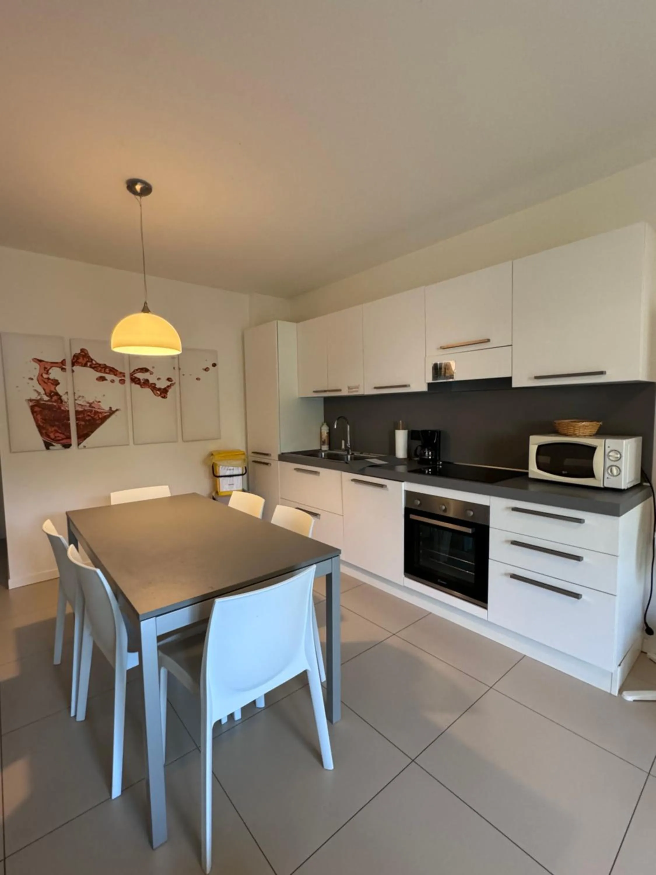 Kitchen or kitchenette in GARDA LIVING APARTMENTS Riva del Garda
