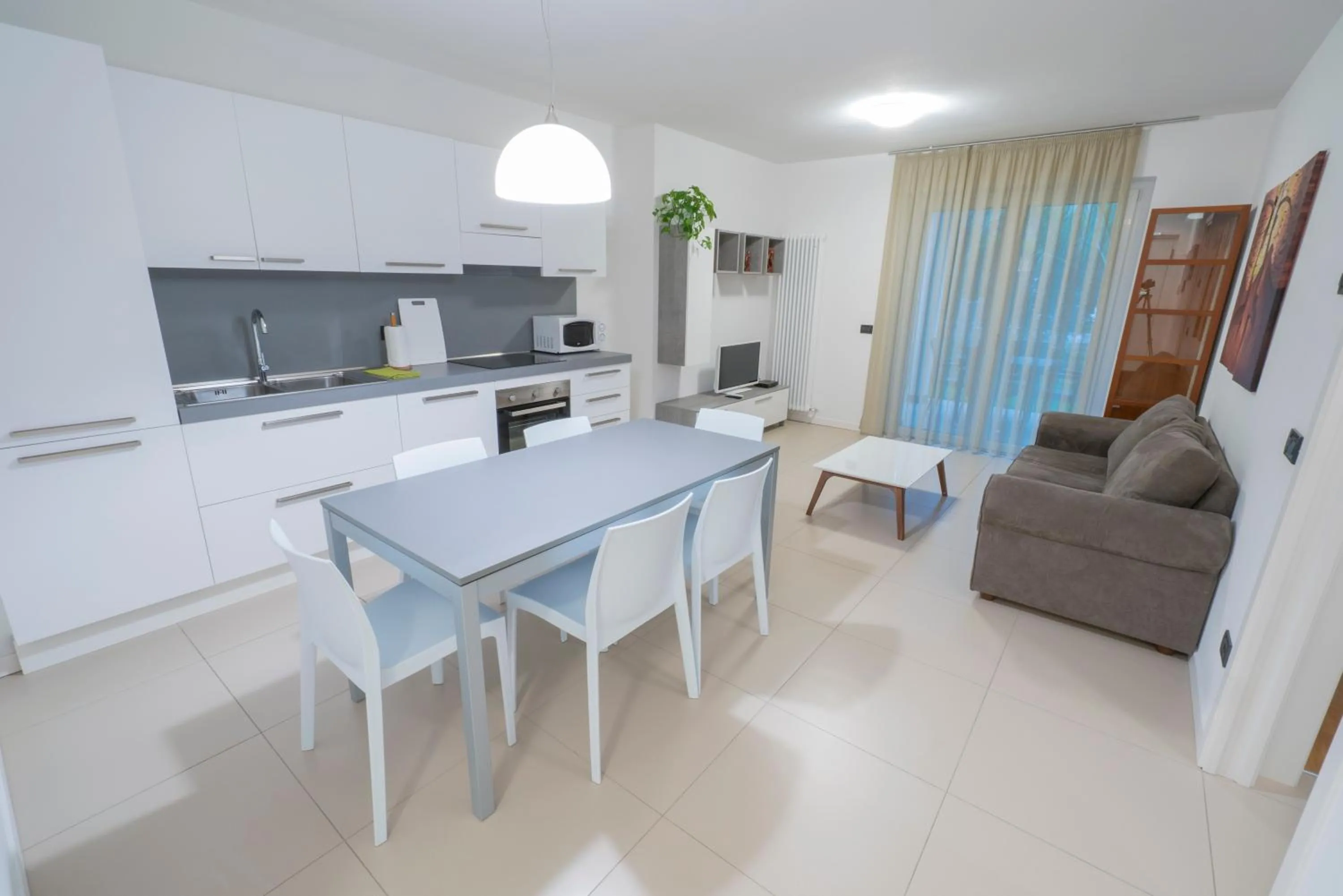 Living room in GARDA LIVING APARTMENTS Riva del Garda