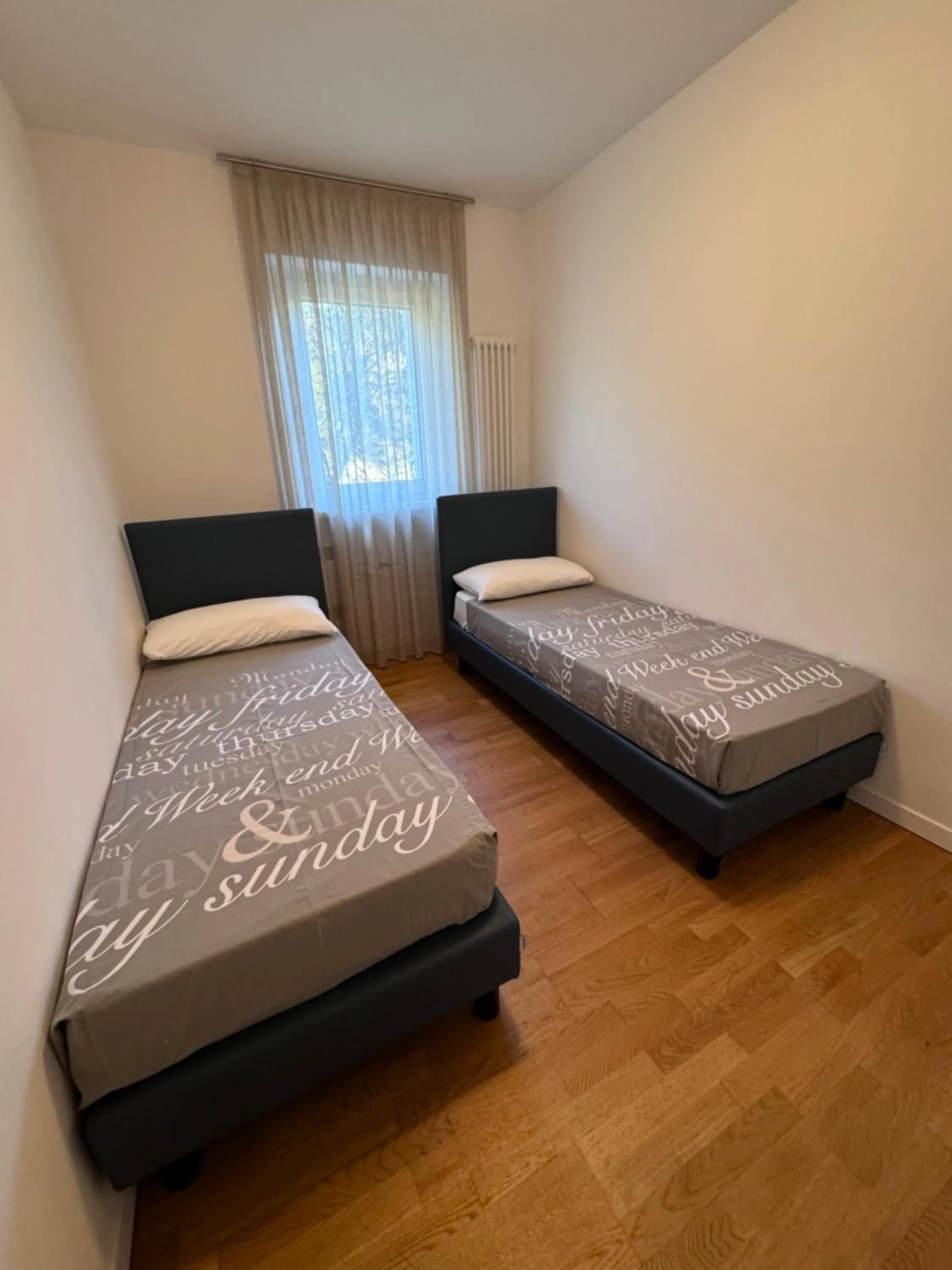 Bedroom, Bed in GARDA LIVING APARTMENTS Riva del Garda