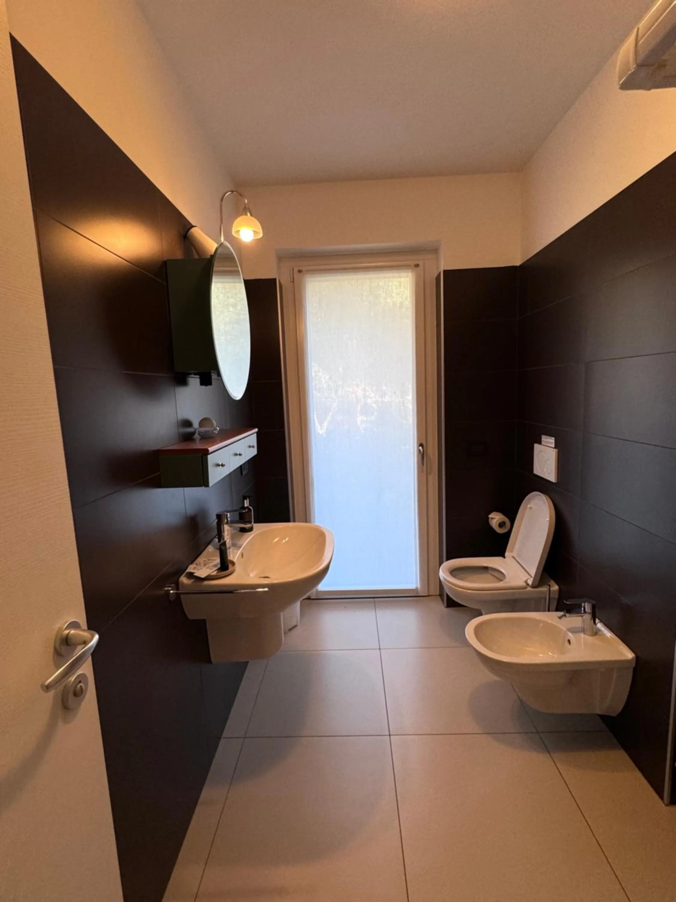 Shower in GARDA LIVING APARTMENTS Riva del Garda