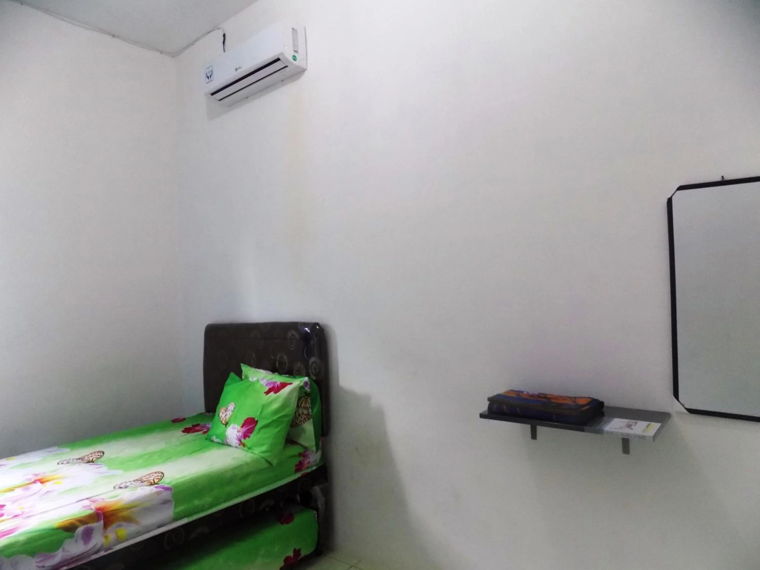 Bed in Amelia 2 Guest House Syariah