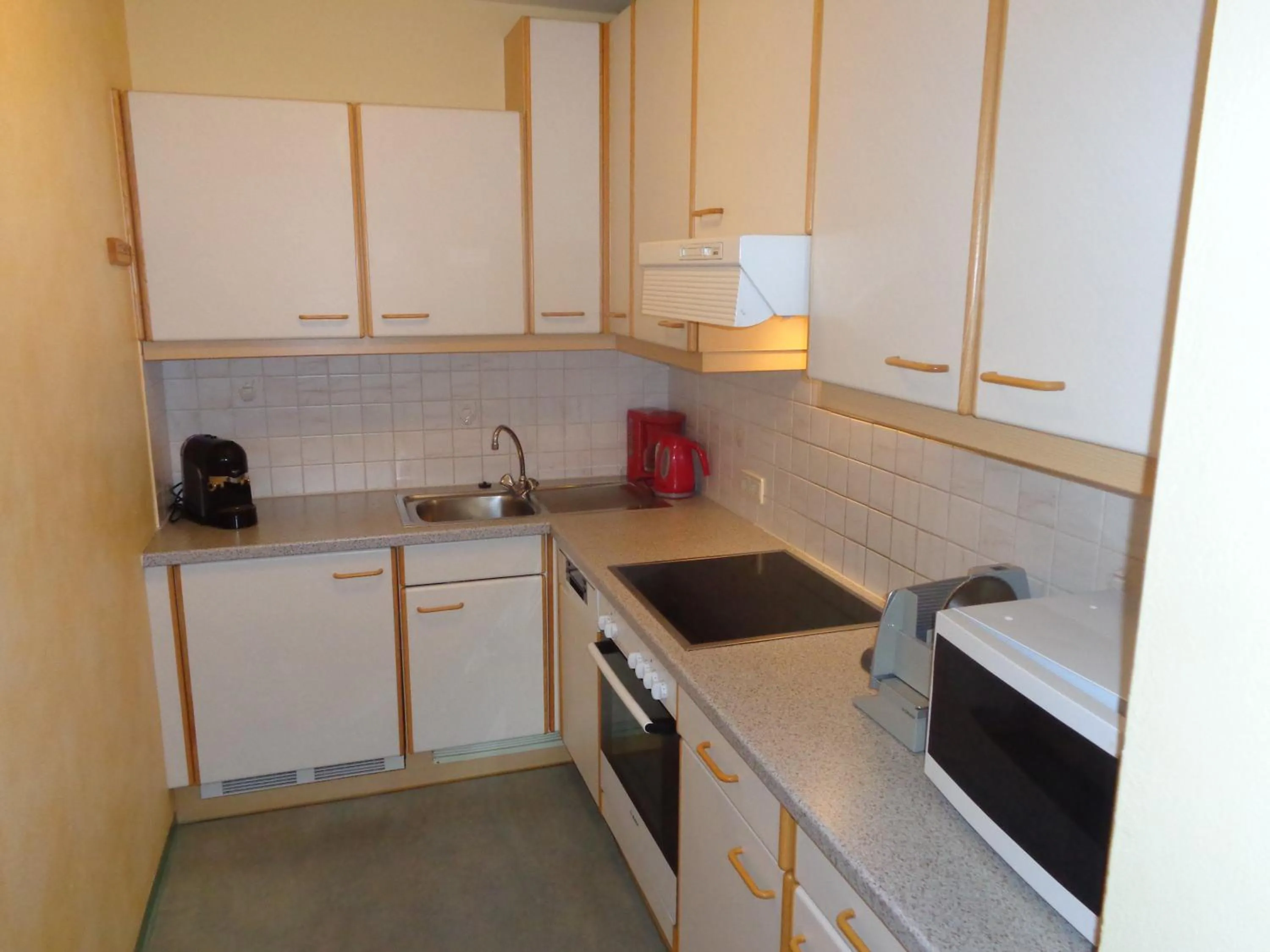 Kitchen or kitchenette in Holiday-Appartements