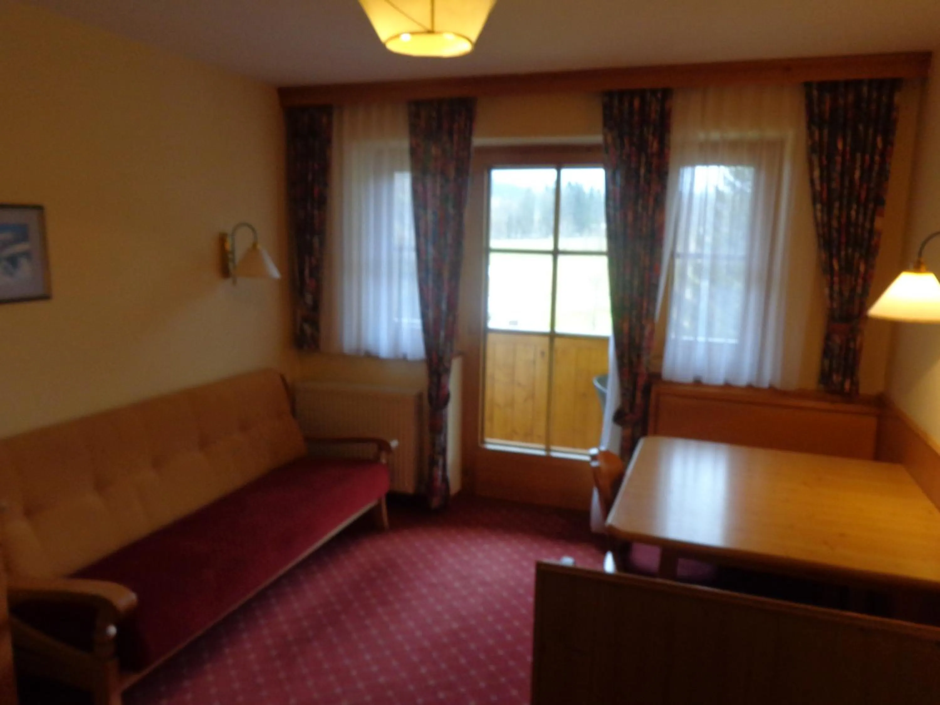Living room, Bed in Holiday-Appartements