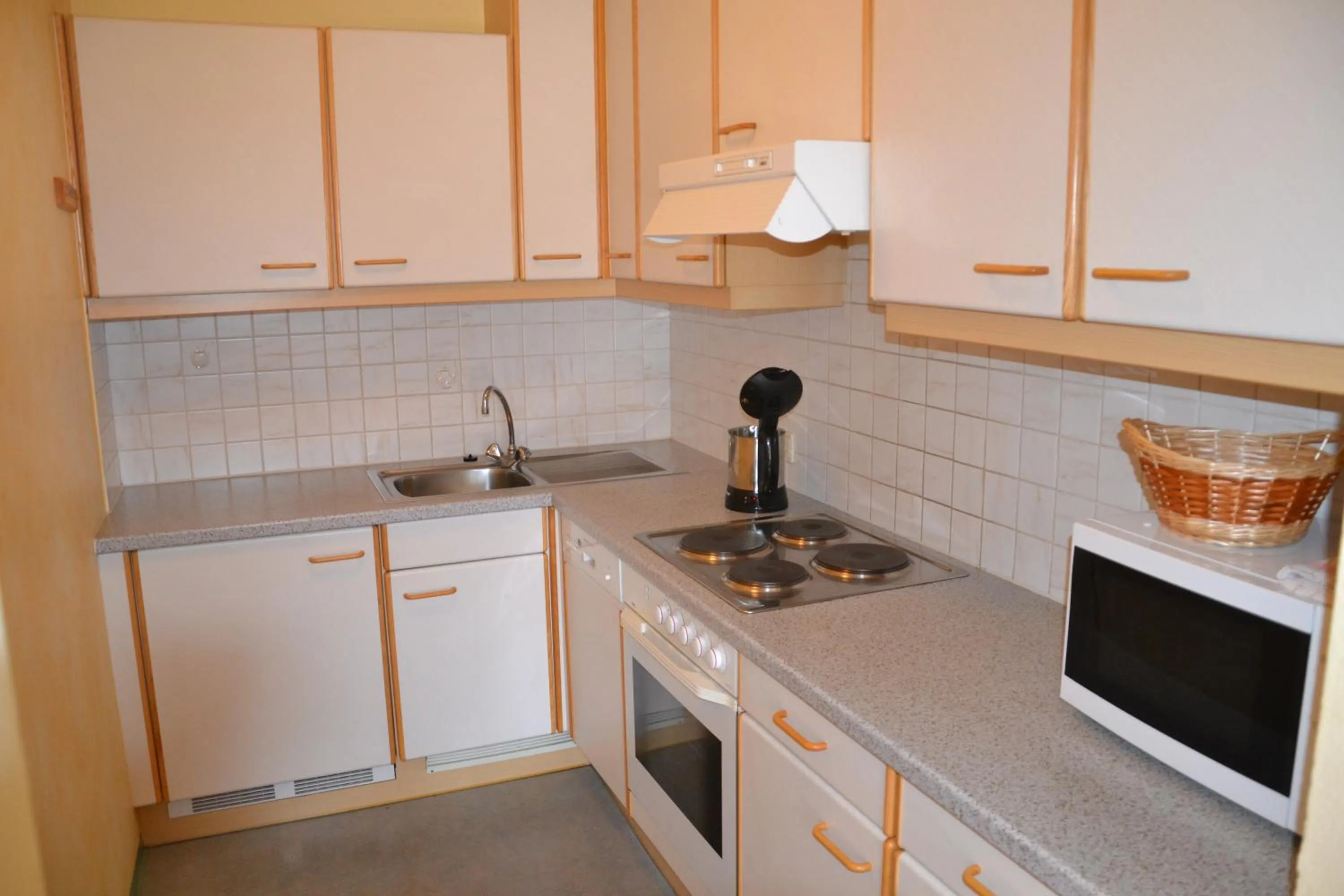 Kitchen or kitchenette in Holiday-Appartements