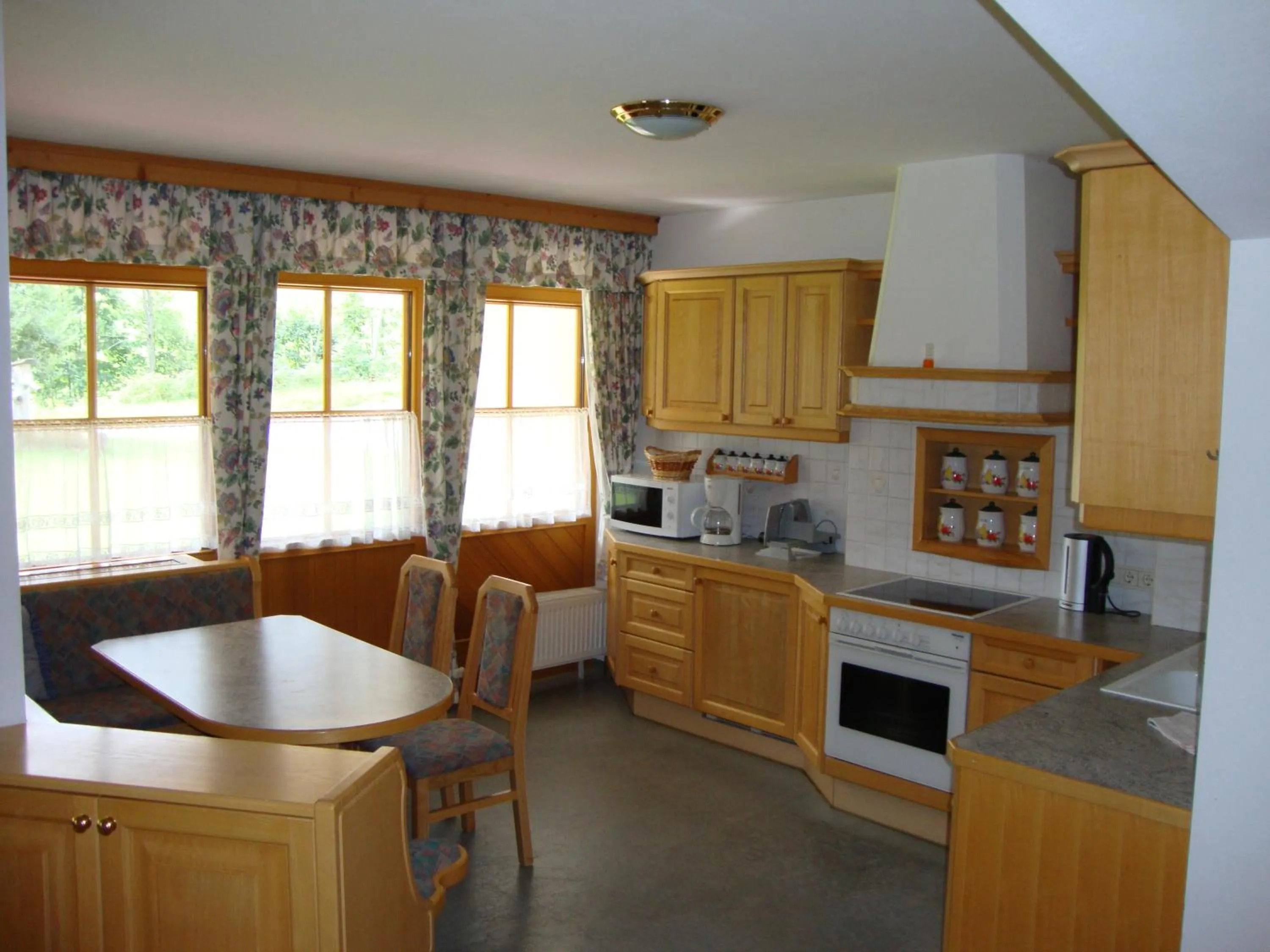 Kitchen or kitchenette in Holiday-Appartements