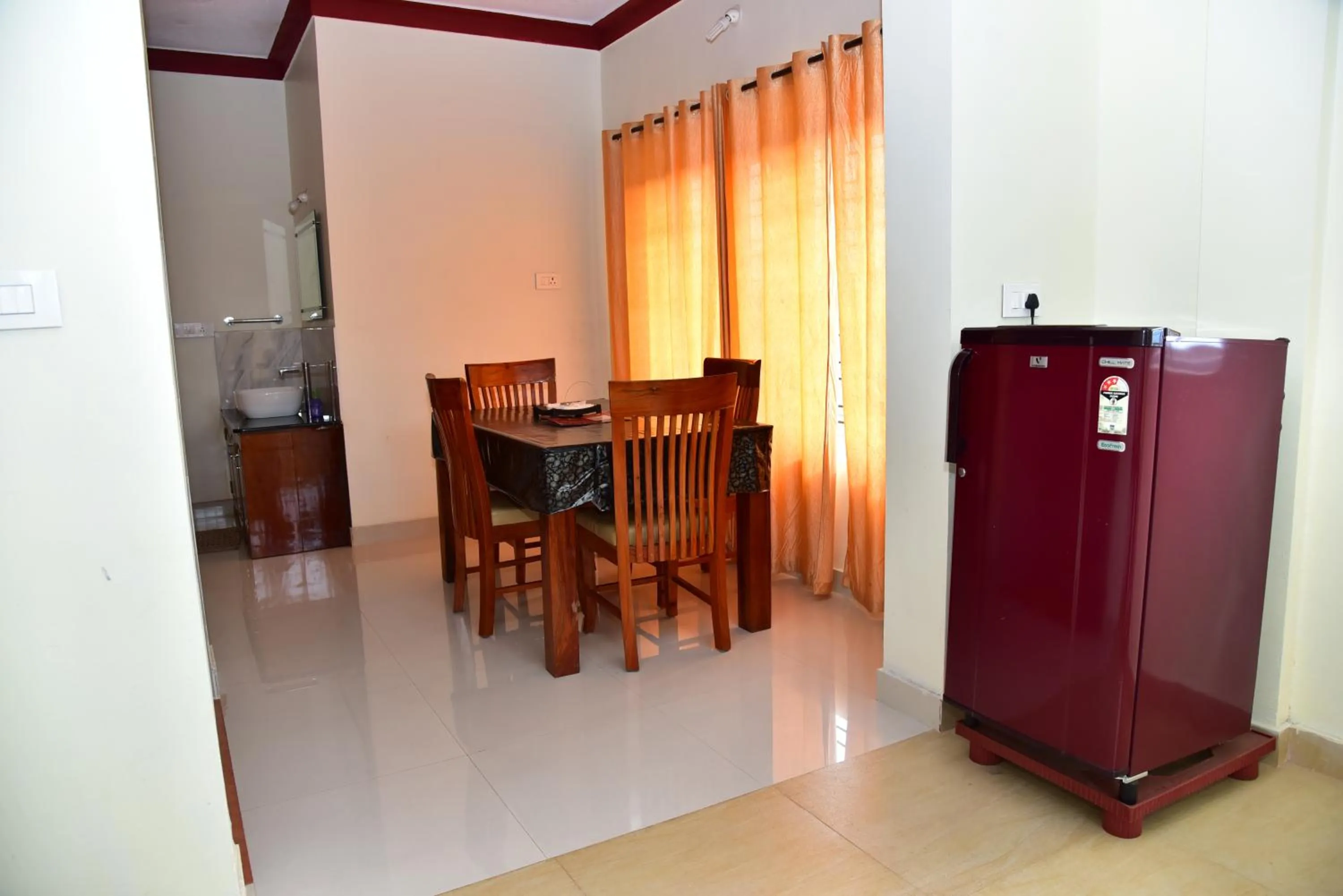 Kitchen or kitchenette in Holidayincoorg Orchid Villa