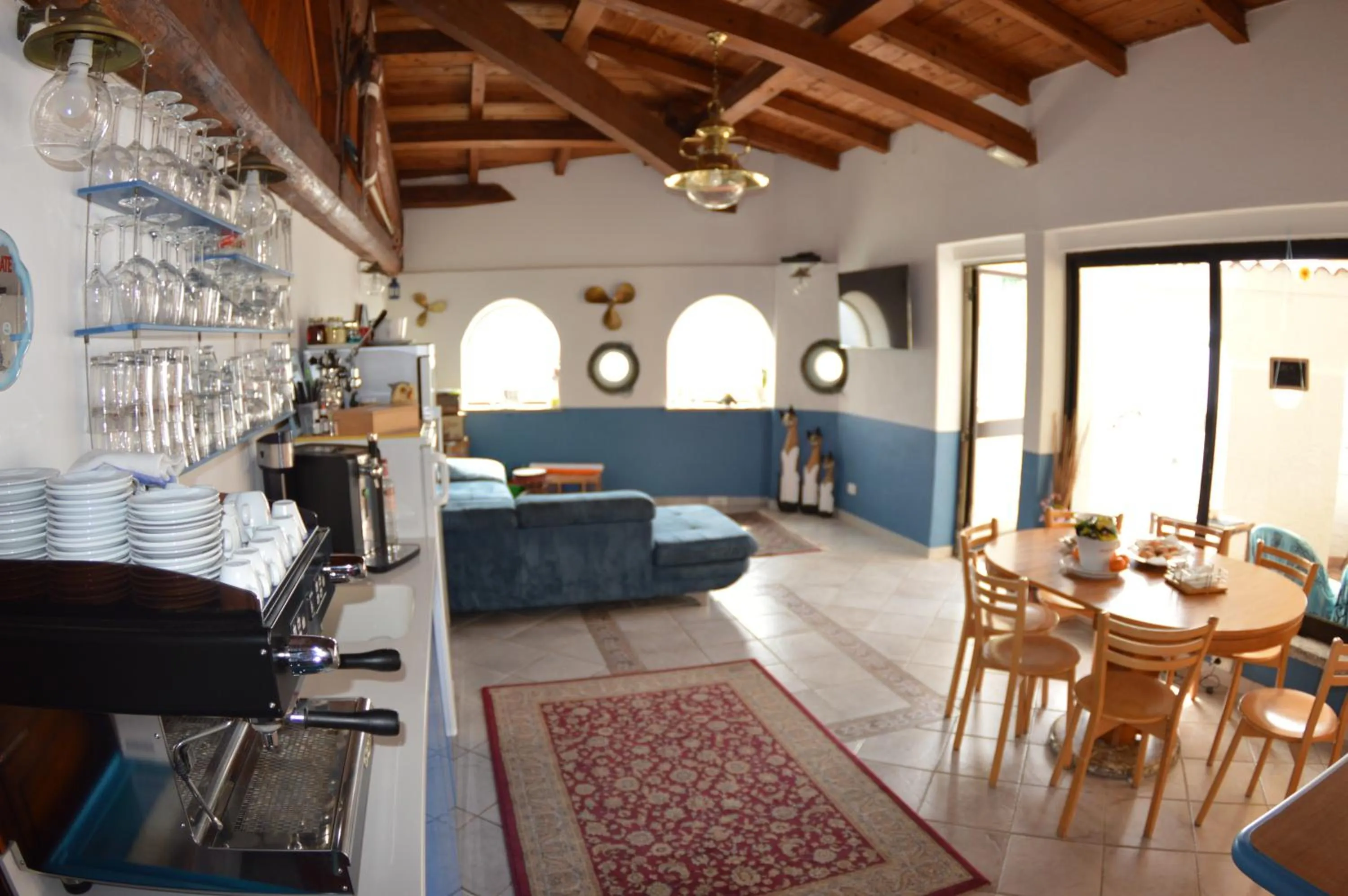 Communal lounge/ TV room in Residence Villa Miky