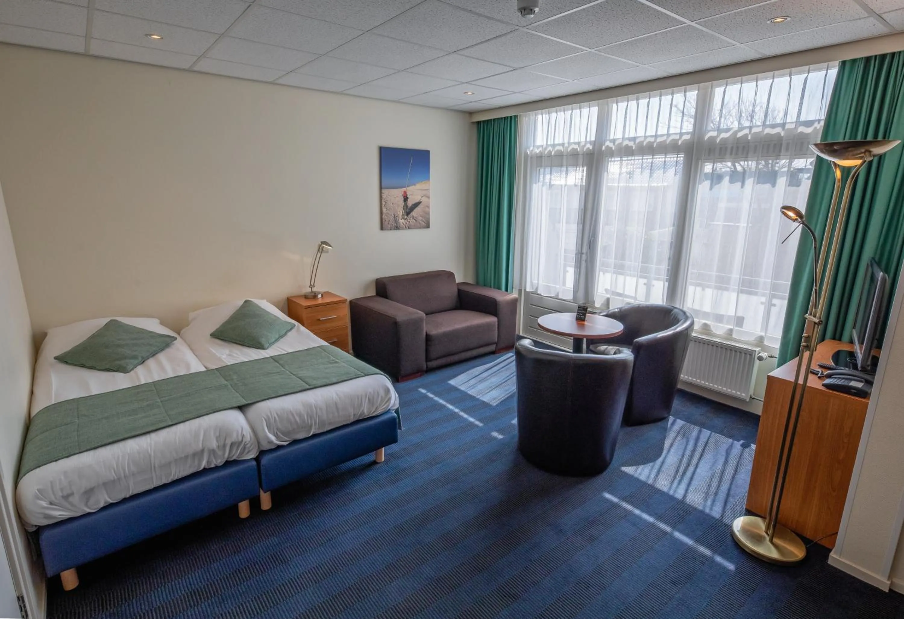 Seating area, Bed in Hotel de Branding