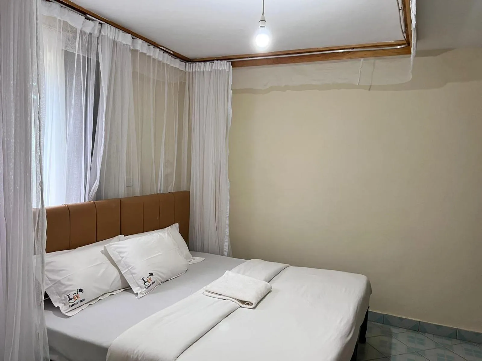 Bed in Lavender Garden Hotel