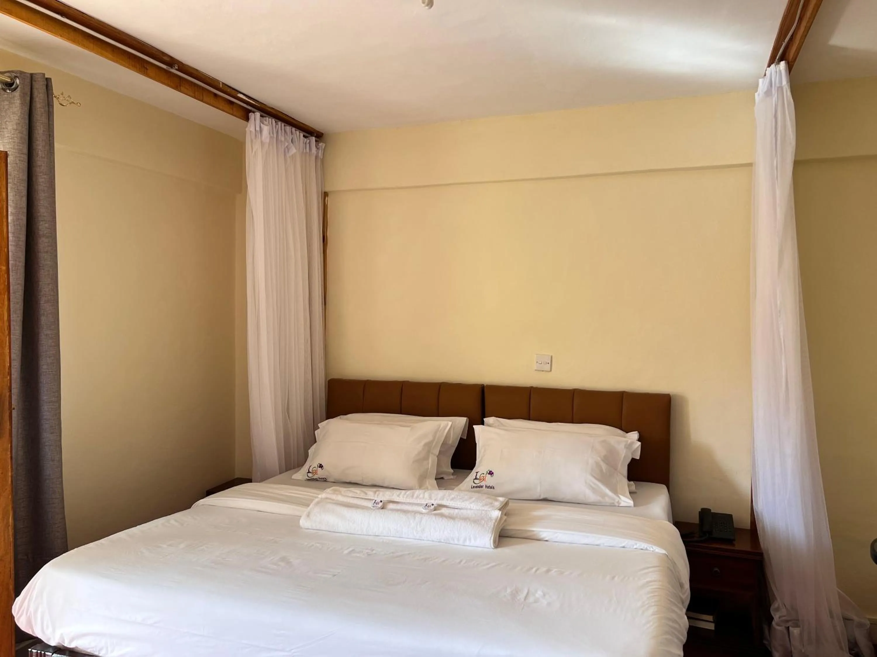 Bed in Lavender Garden Hotel