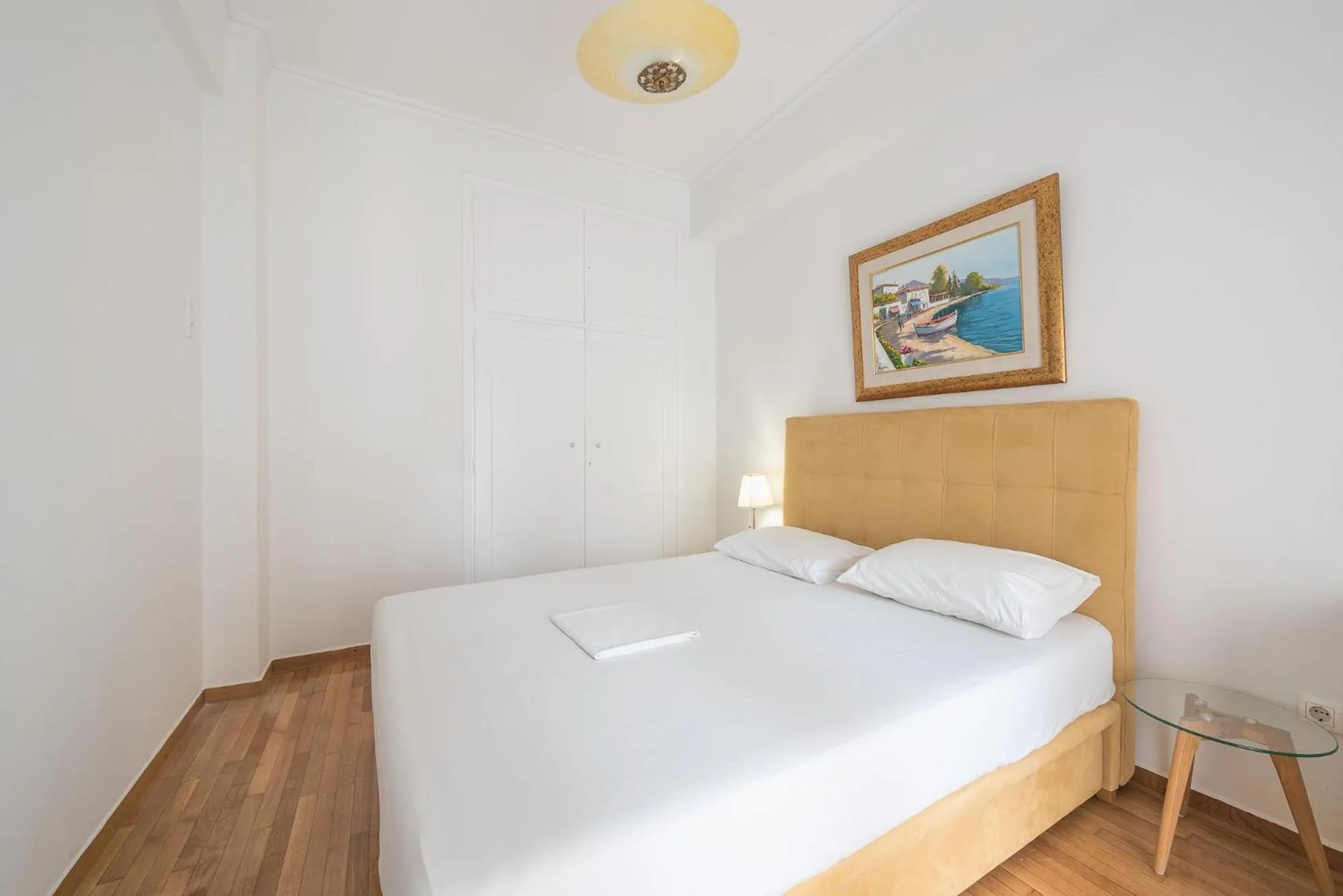 Bed in Victoria Secret Apartments