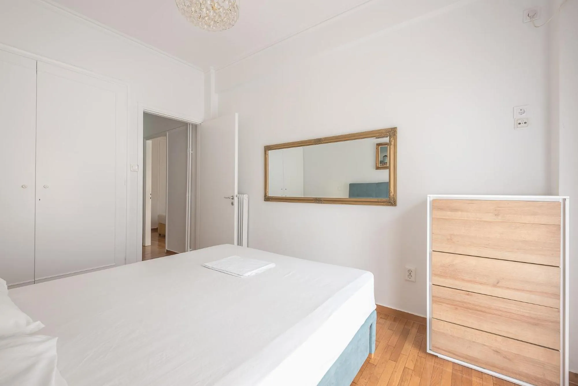 Bed in Victoria Secret Apartments