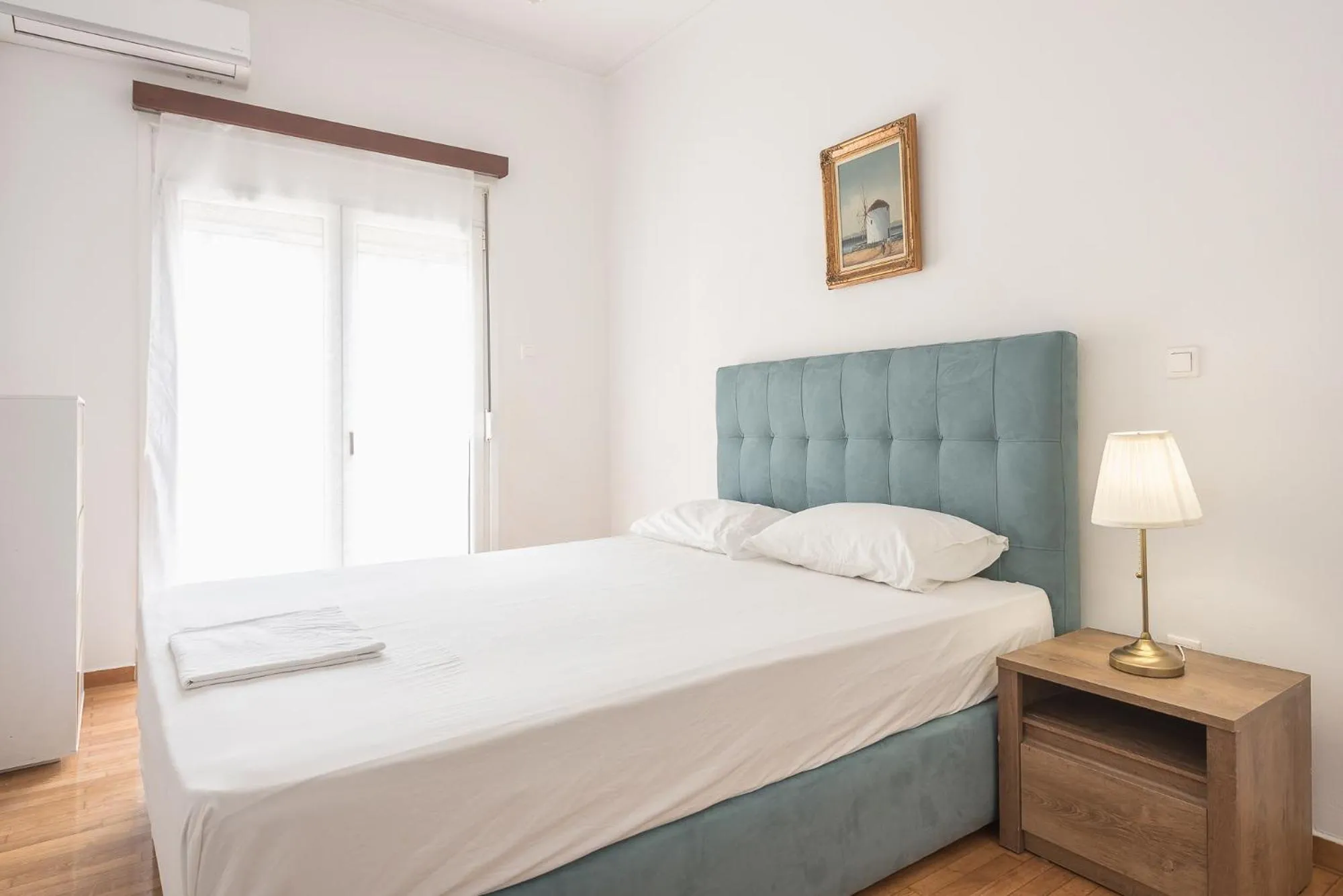 Bed in Victoria Secret Apartments