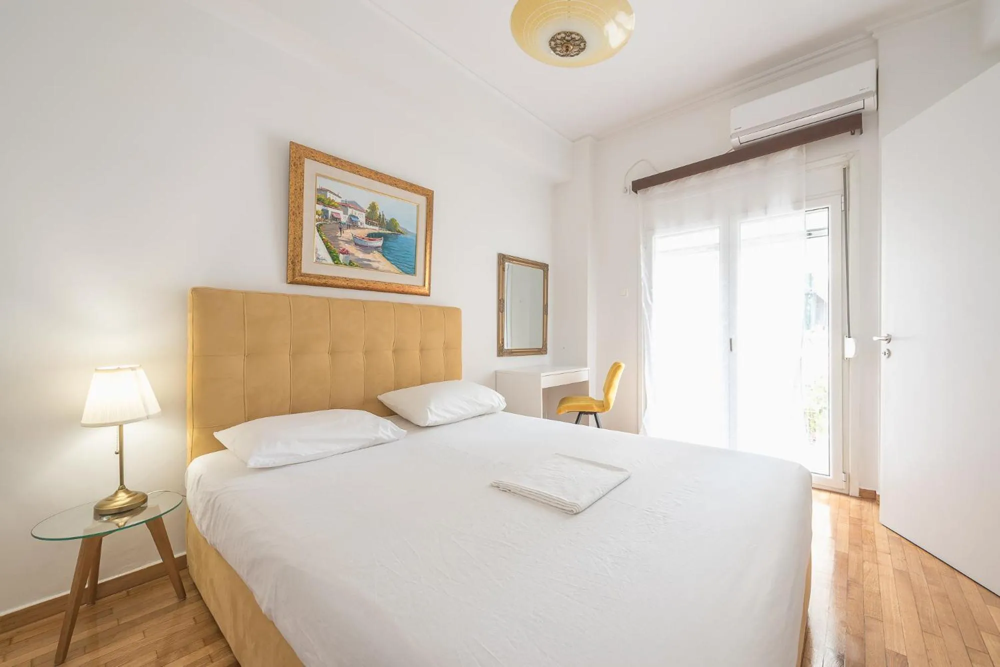 Bed in Victoria Secret Apartments