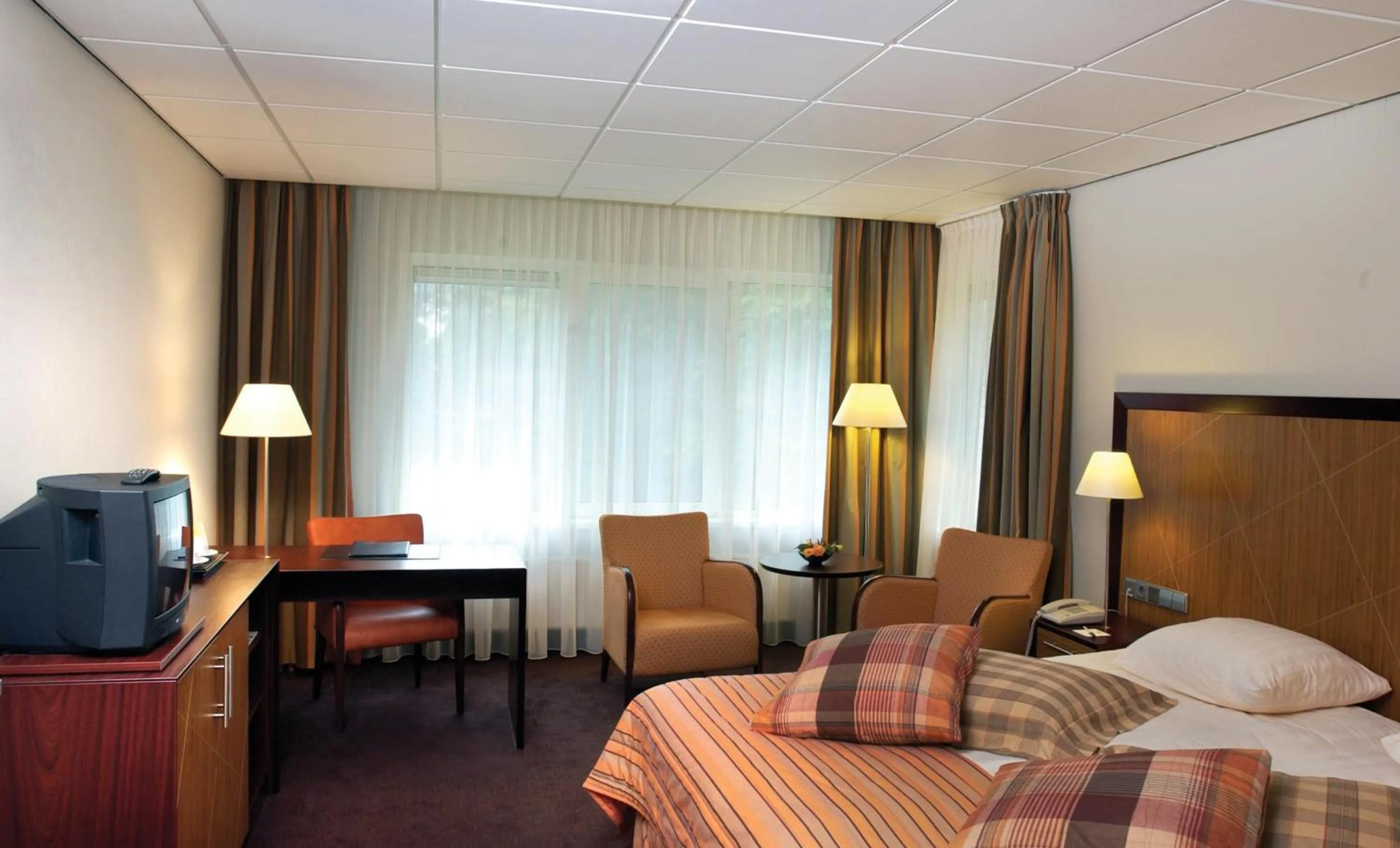 Photo of the whole room, Bed in Fletcher Familiehotel Paterswolde