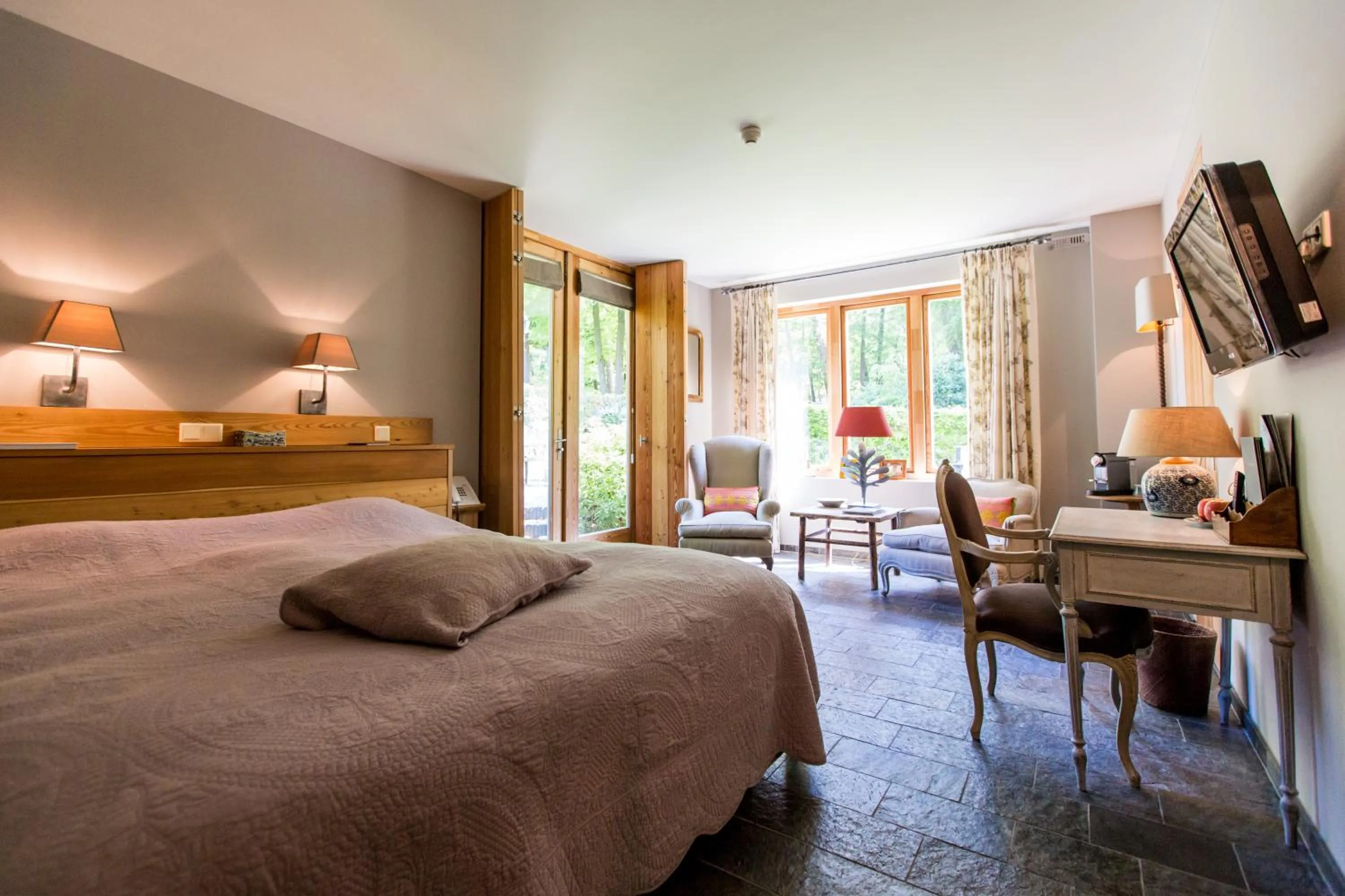 Bed in Relais & Chateaux Hotel Landgoed Het Roode Koper