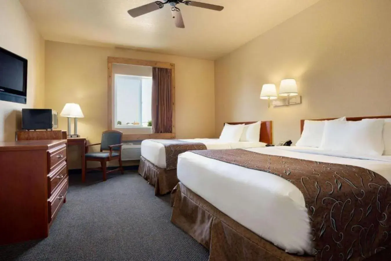 Queen Room with Two Queen Beds - Non-Smoking in Travelodge by Wyndham Gillette Queen Room with Two Queen Beds - Non-Smoking in Travelodge by Wyndham Gillette