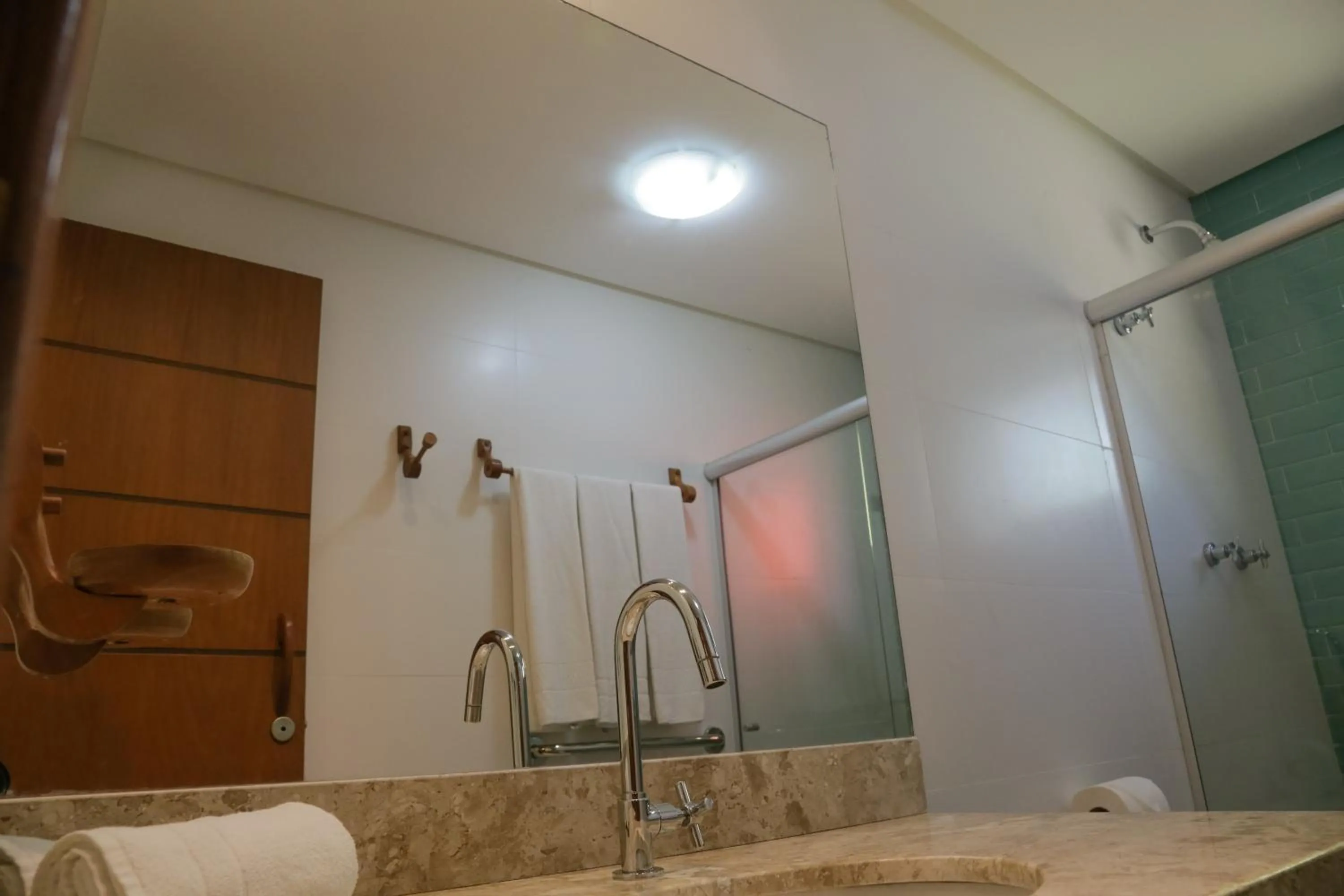 Bathroom in Cores do Arraial Residence Hotel