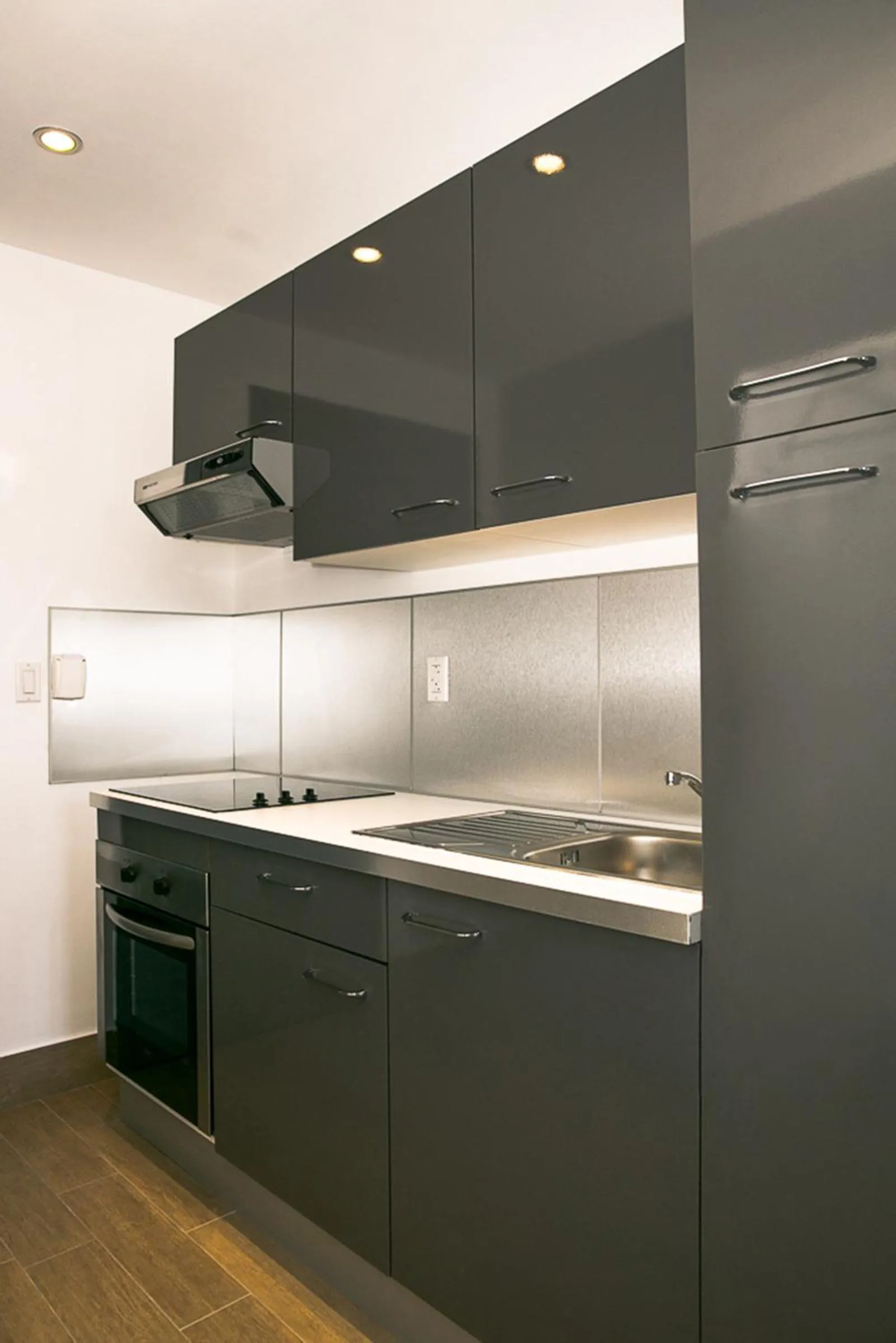 Kitchen or kitchenette in Commodore Suites, SureStay Collection by Best Western