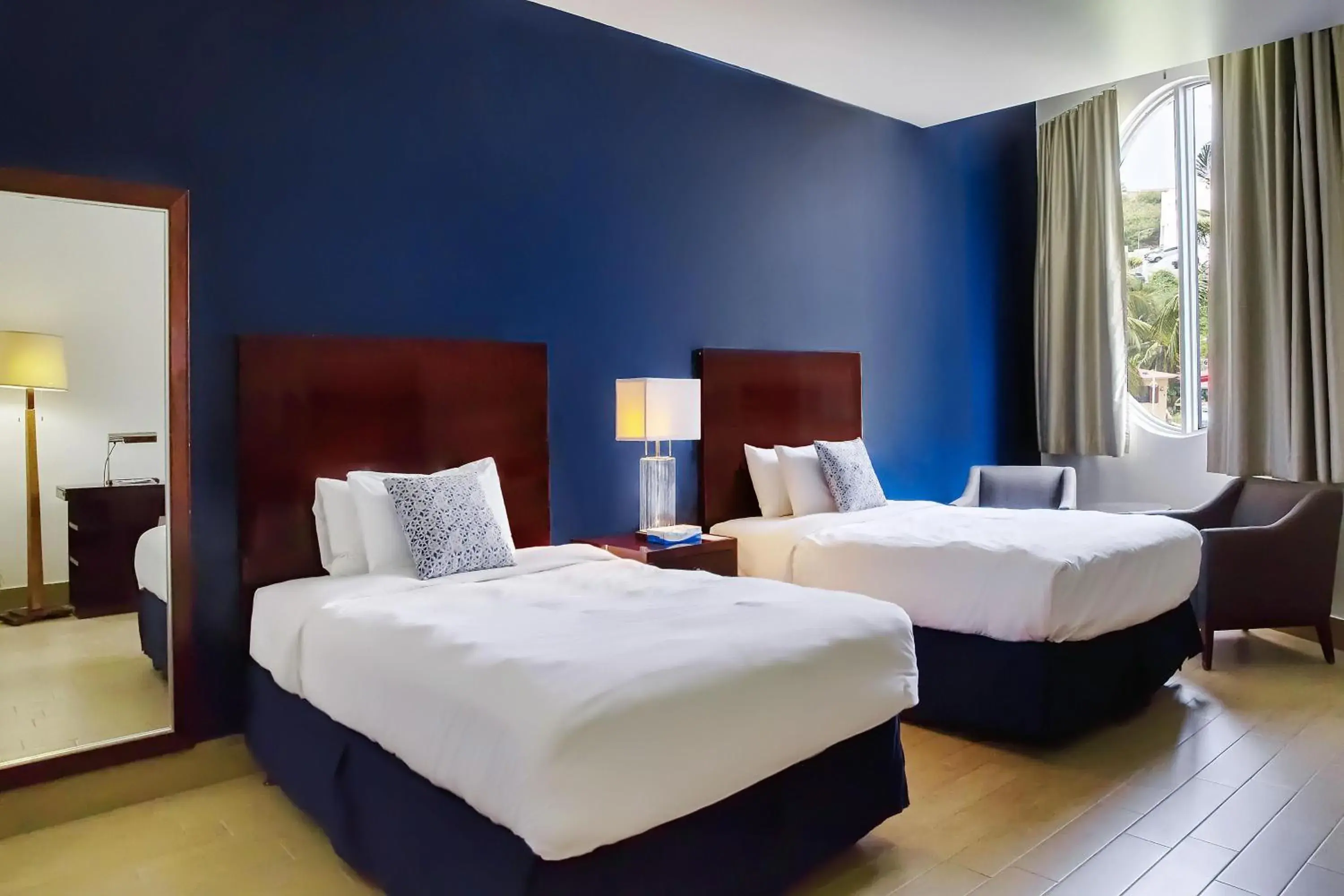 Bedroom, Bed in Commodore Suites, SureStay Collection by Best Western Bedroom, Bed in Commodore Suites, SureStay Collection by Best Western