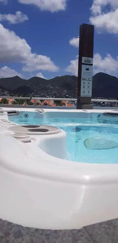 Swimming pool in Commodore Suites, SureStay Collection by Best Western