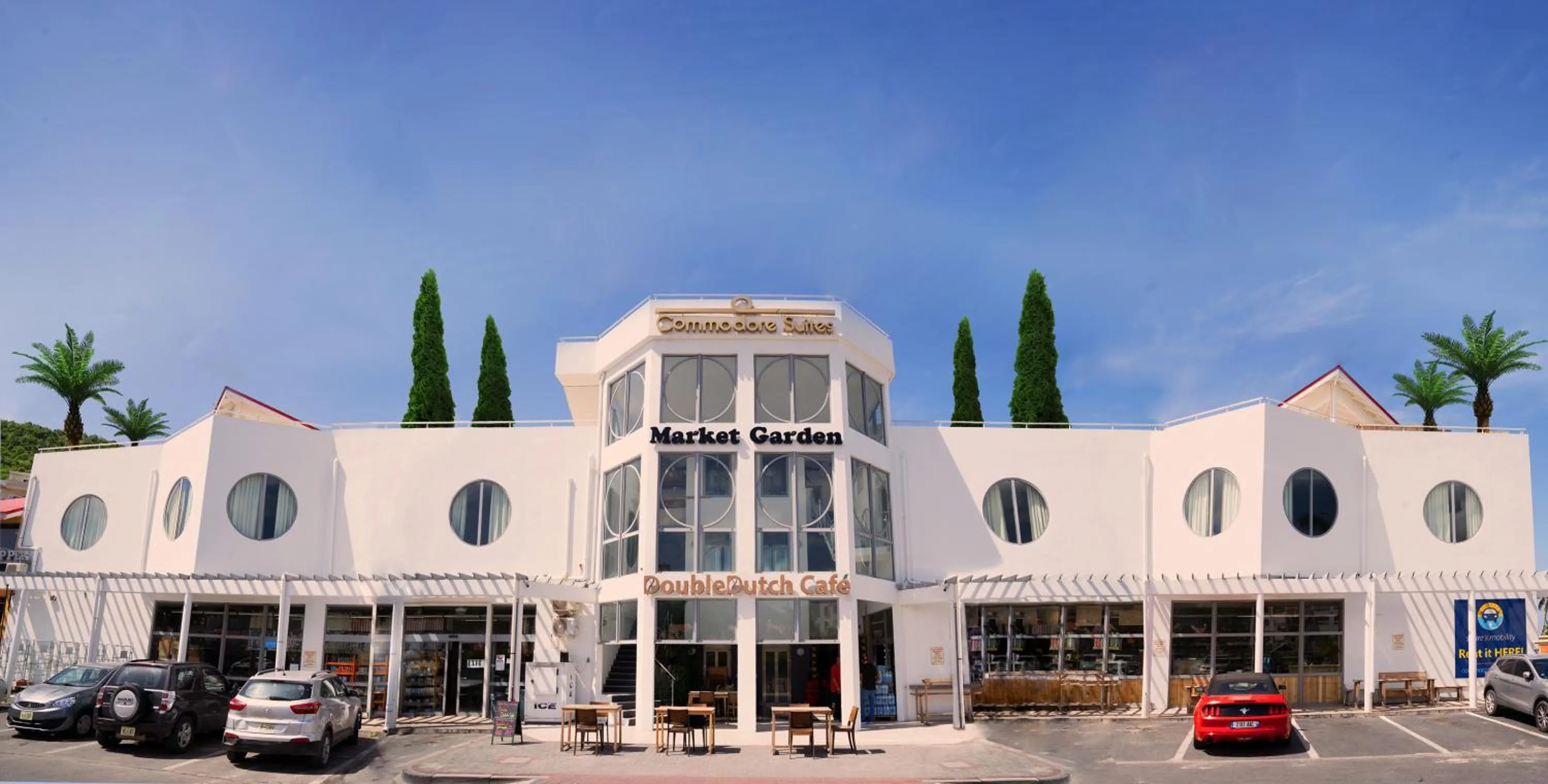 Facade/entrance in Commodore Suites, SureStay Collection by Best Western