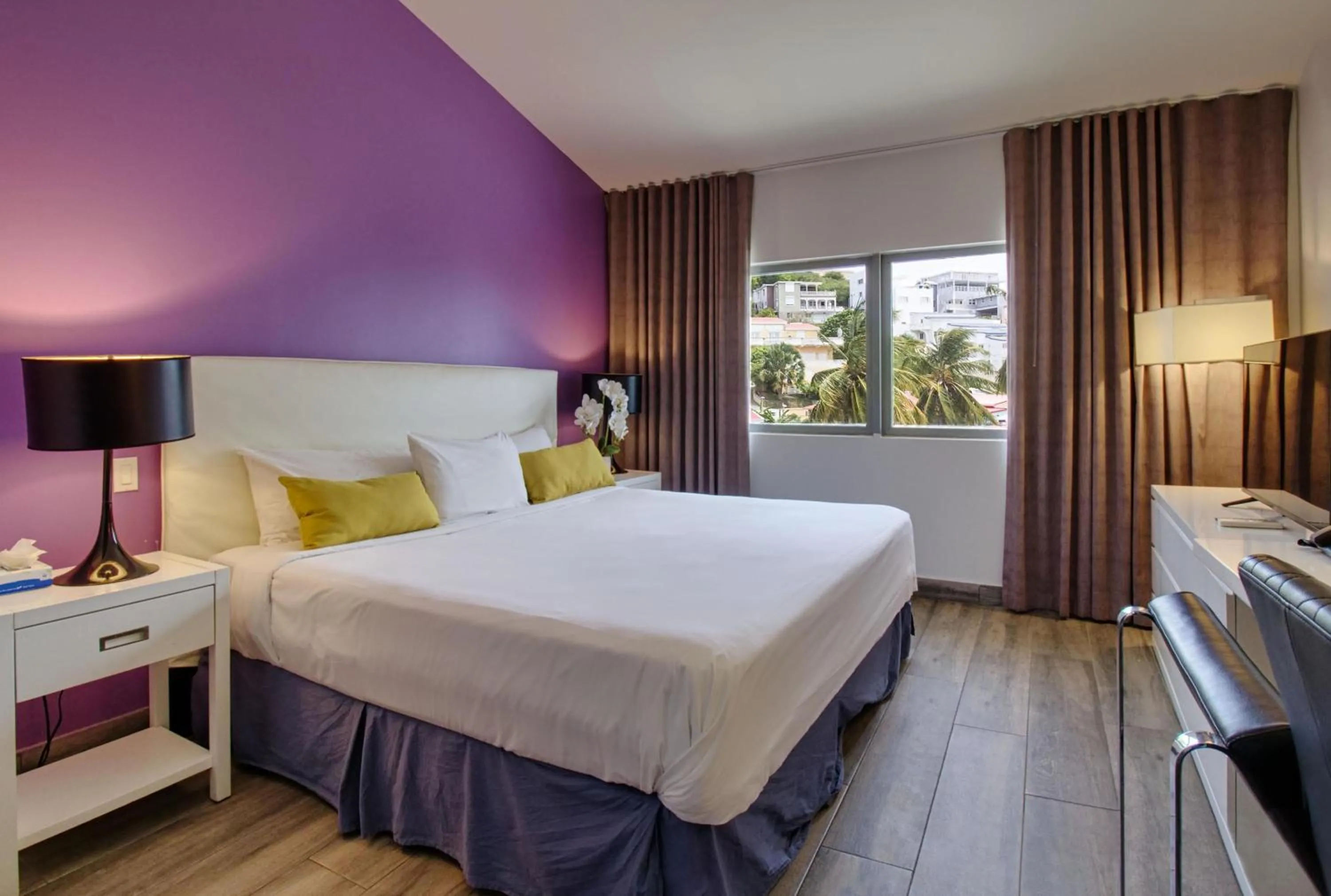 Bedroom, Bed in Commodore Suites, SureStay Collection by Best Western