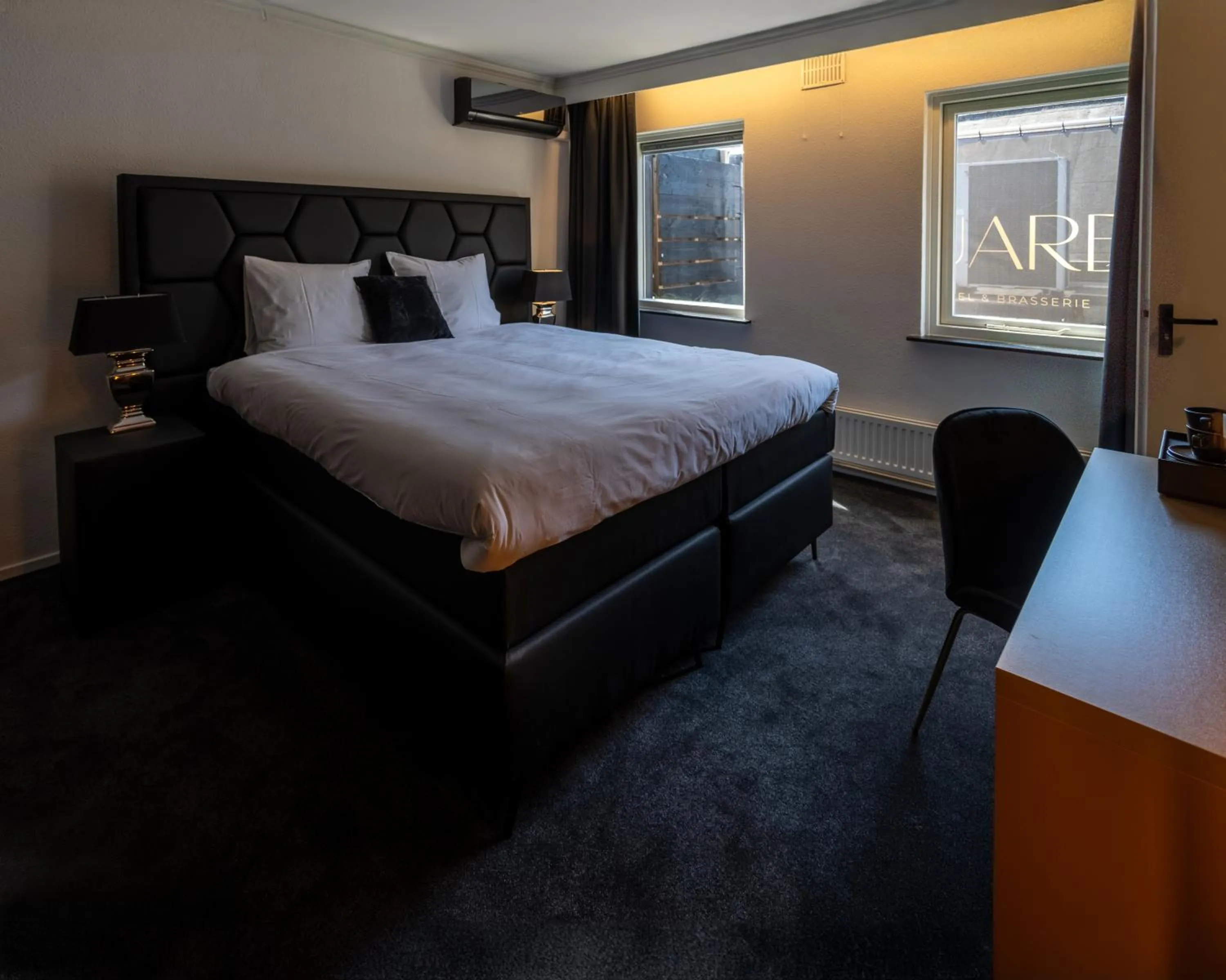 Bed in Square Boutique Hotel & Brasserie