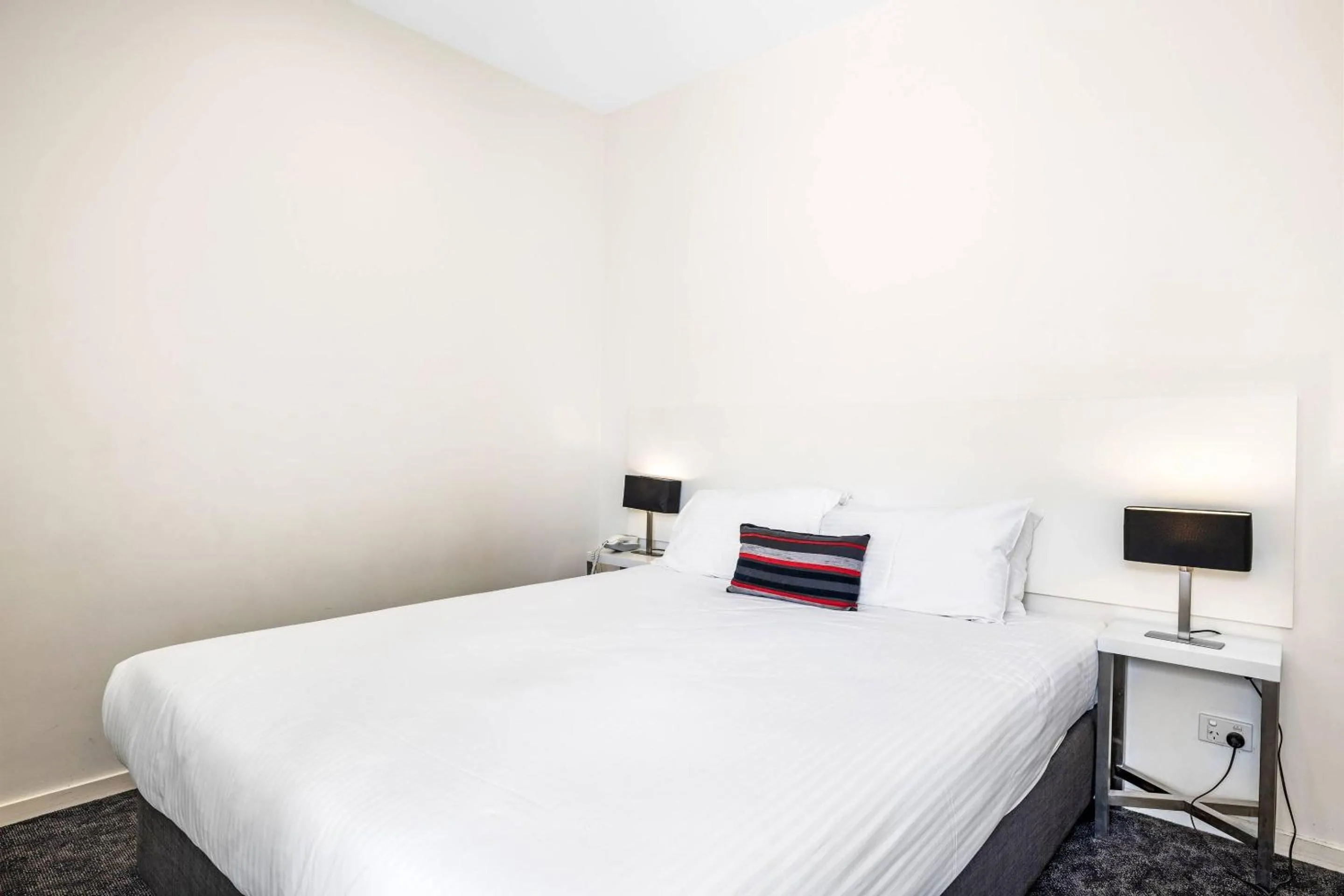 Bedroom, Bed in Comfort Apartments Box Hill
