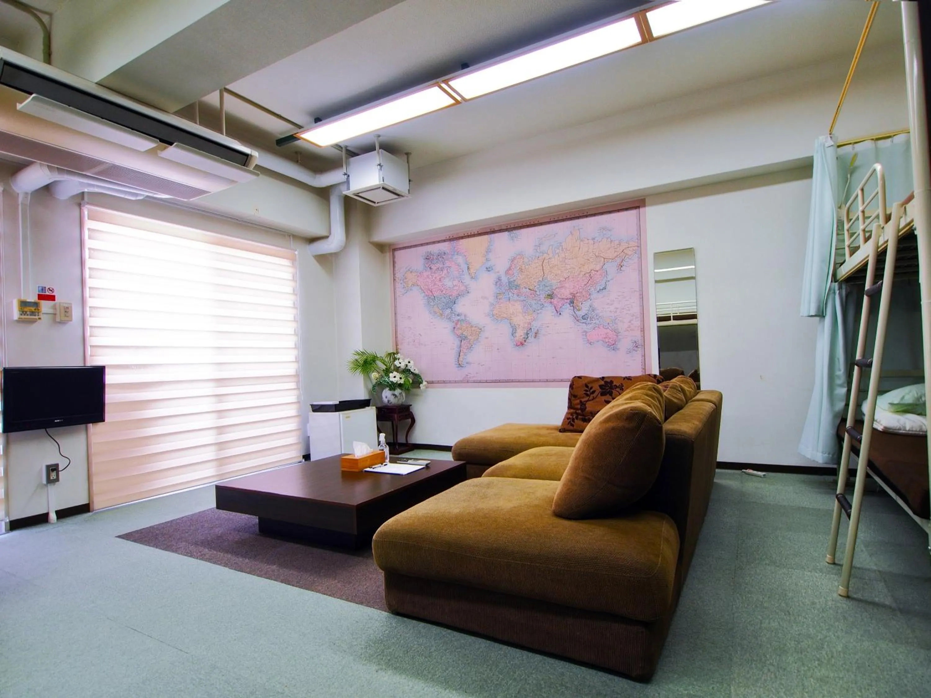 Living room in Omotenashi Hostel Miyajima