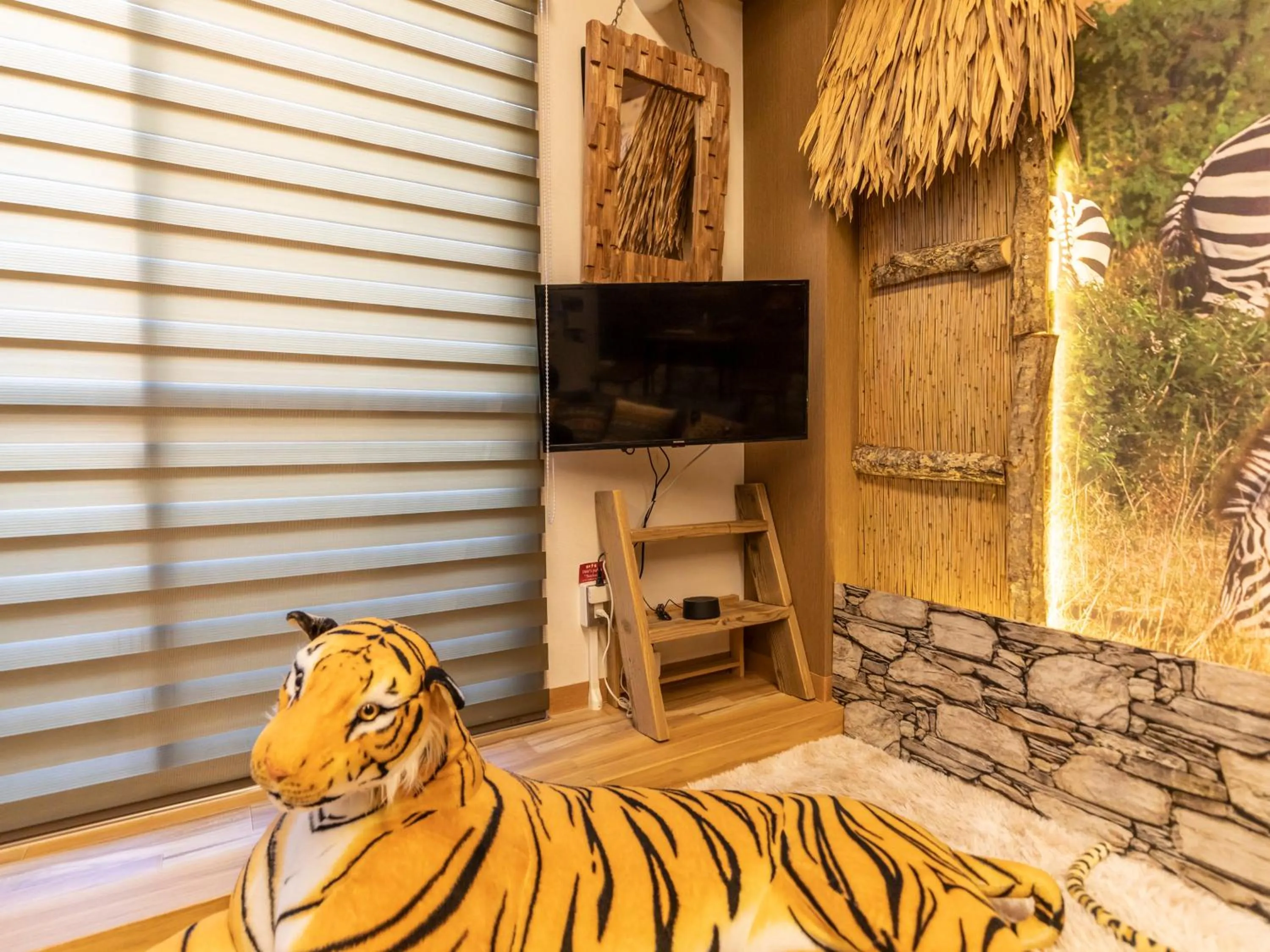 TV and multimedia in Omotenashi Hostel Miyajima