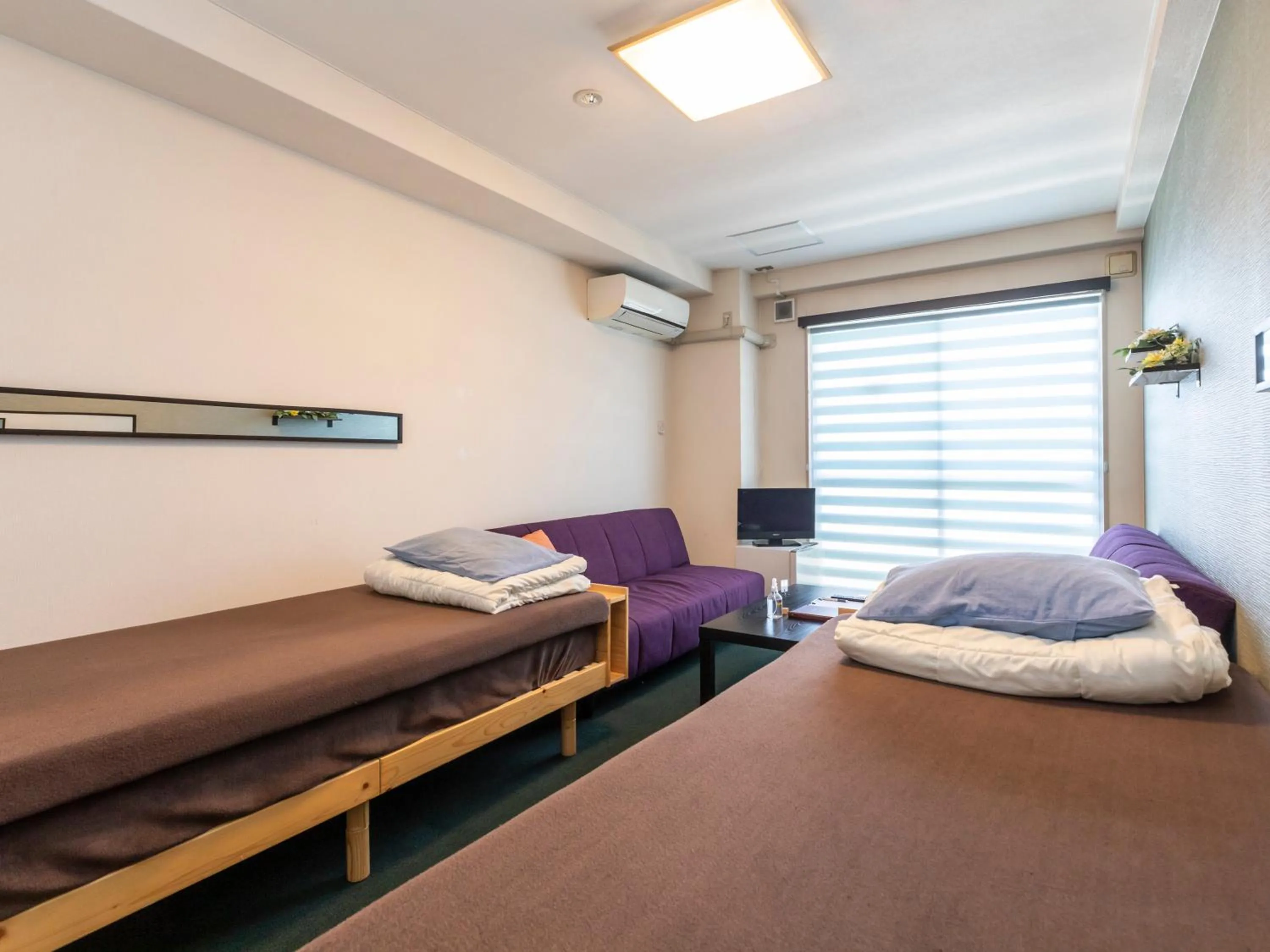 Bed in Omotenashi Hostel Miyajima